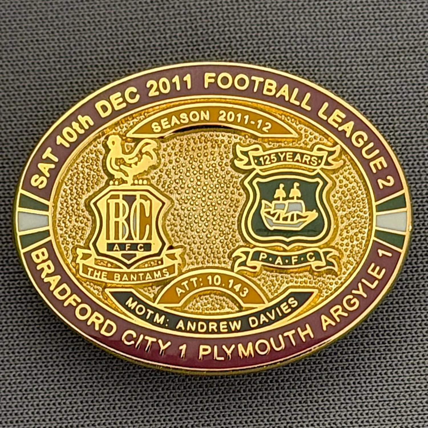 Reference Number: BCFIX079
Size: H 23.6 mm x W 28.7 mm
Pin Type: Brooch Pin
Plating: Gold
Value: £8
Manufacturer: Bradford City Badges
Comments: Bradford City v Plymouth Argyle  2011/12 Limited Edition 80 Badges