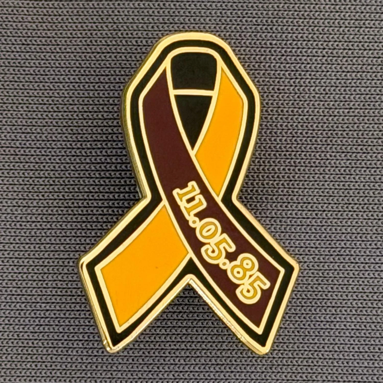 Reference Number: BCFIR014
Size: H 25.7 mm x W 17.8 mm
Pin Type: Metal Clutch
Plating: Gold
Value: £8
Manufacturer: Friends of Bradford City
Comments: Limited Edition of 850, Claret, Amber & Black ribbon, to raise money for the PSBRU.