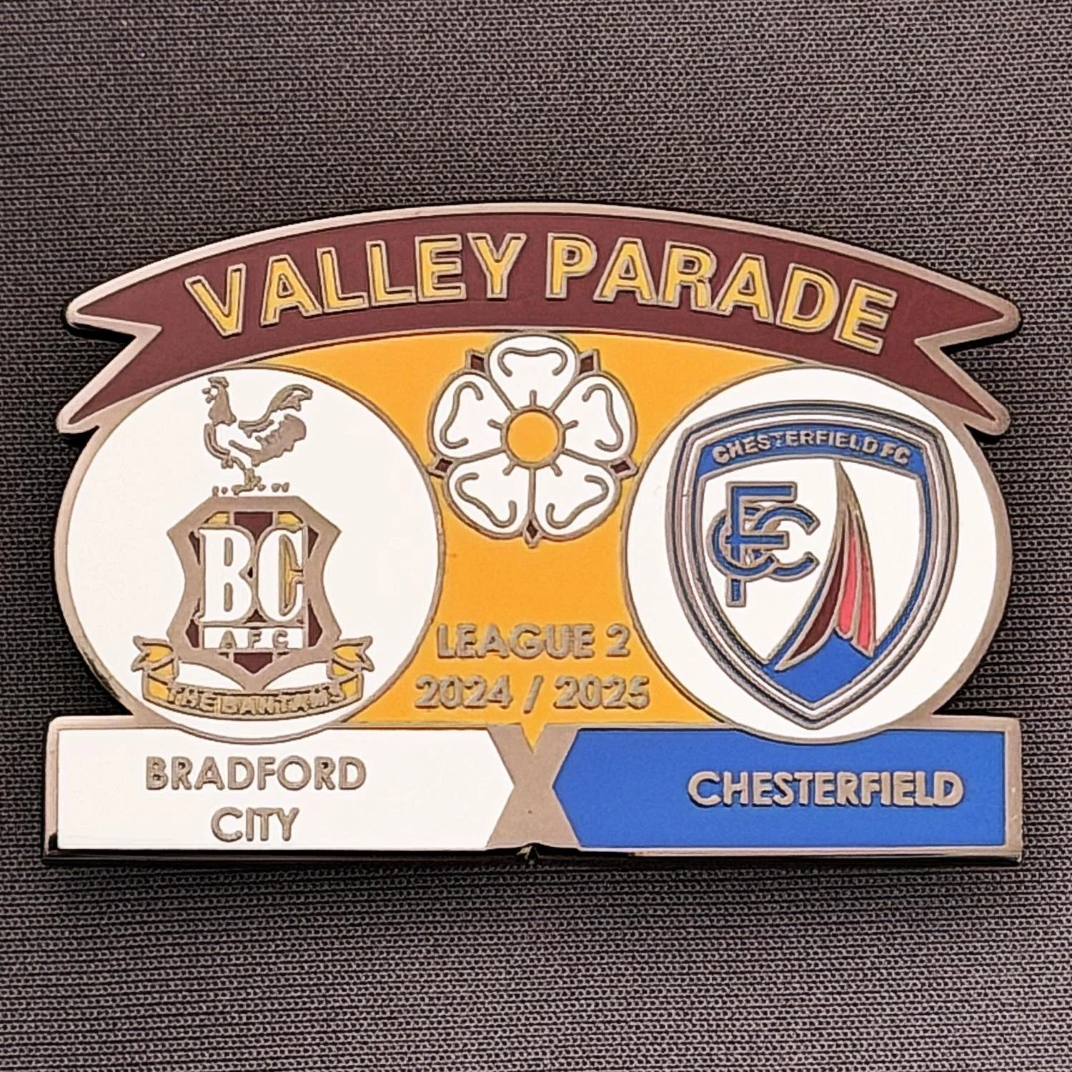 Reference Number: BCFIX426
Size: H 34.3 mm x W 50 mm
Pin Type: Brooch Pin
Plating: Black Nickel
Value: £5
Manufacturer: Unknown
Comments: Bradford City v Chesterfield 2024/25.
