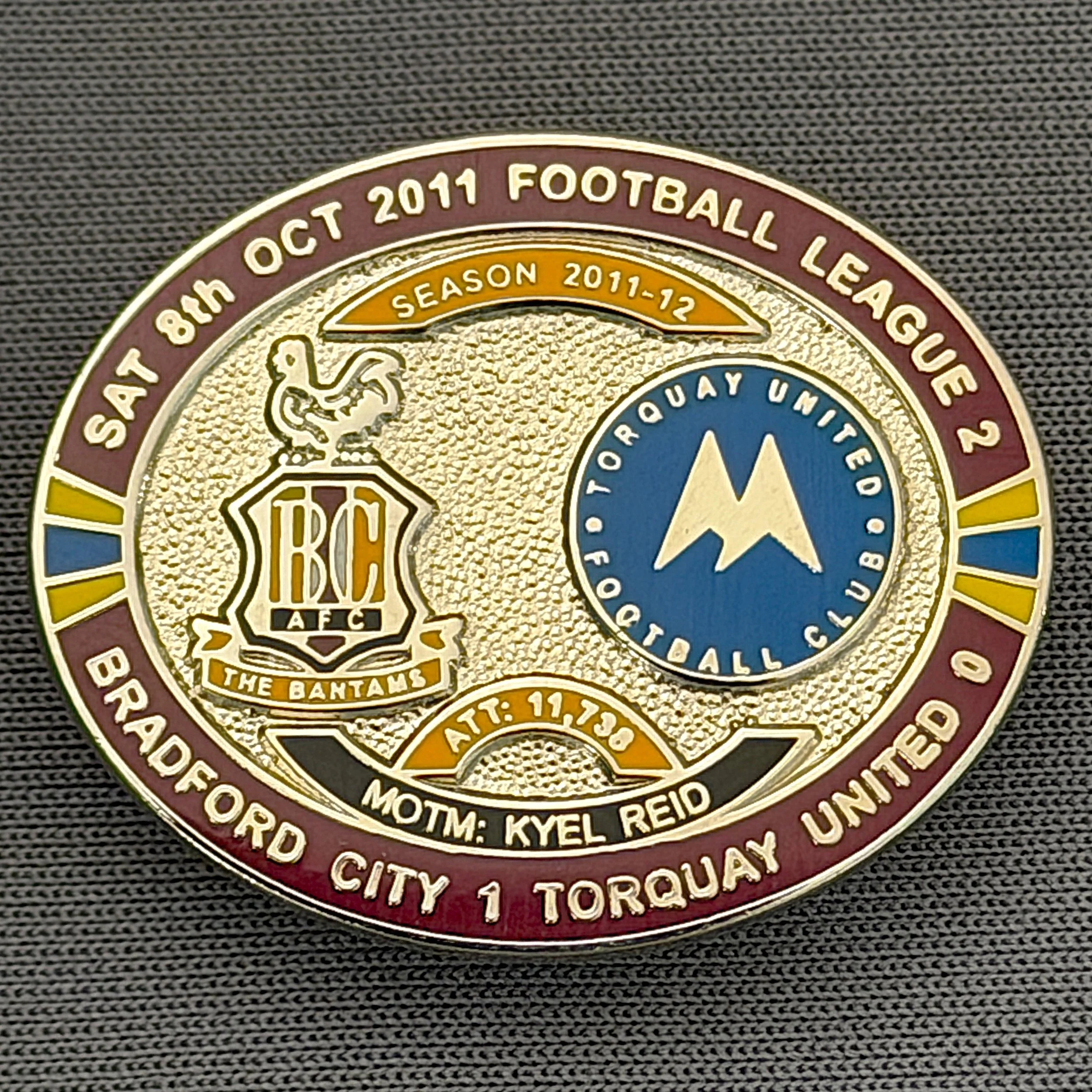 Reference Number: BCFIX098
Size: H 23.6 mm x W 28.7 mm
Pin Type: Brooch Pin
Plating: Silver
Value: £10
Manufacturer: Bradford City Badges
Comments: Bradford City v Torquay United  2011/12 Limited Edition 20 Badges (Silver Version)