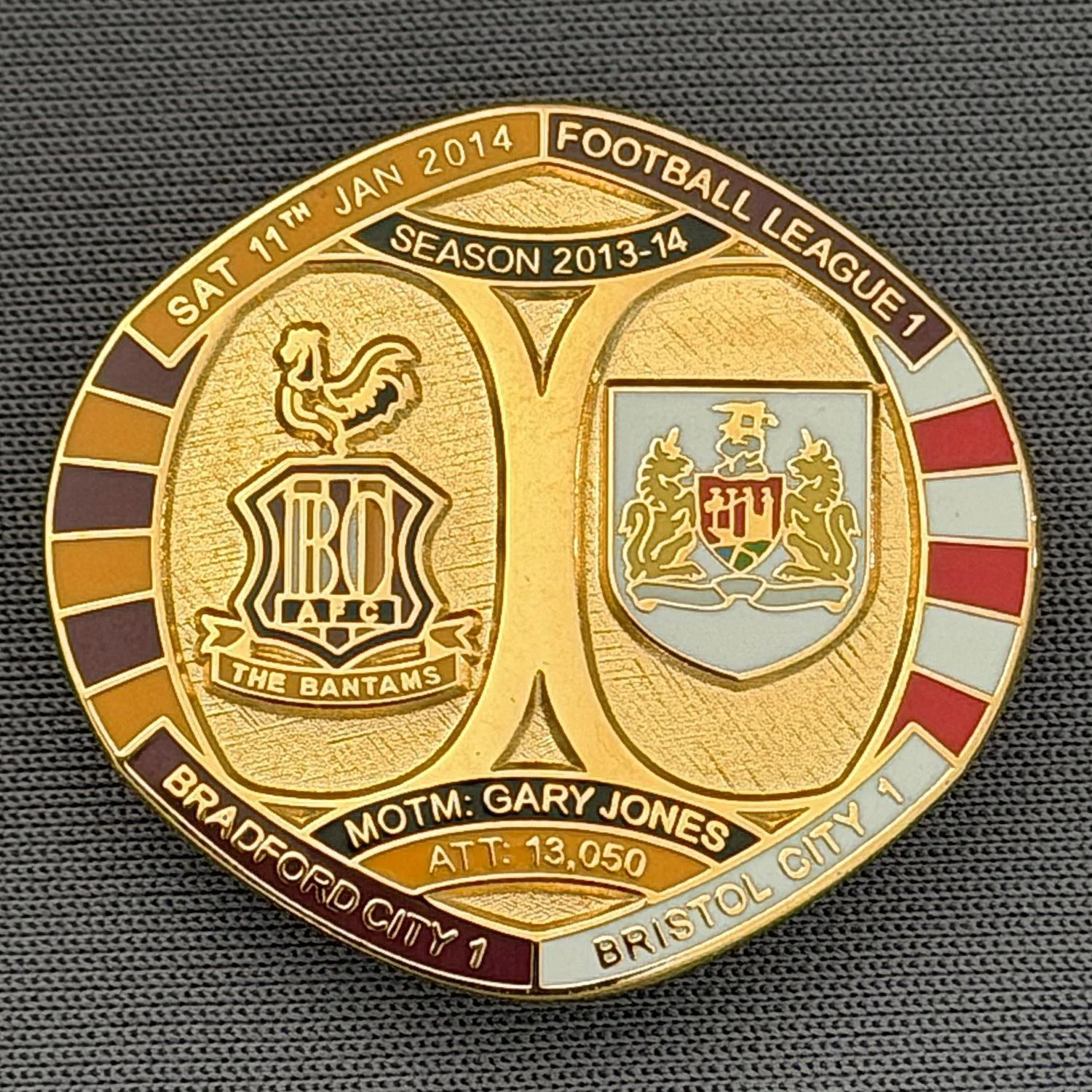 Reference Number: BCFIX197
Size: H 26.3 mm x W 28.9 mm
Pin Type: Brooch Pin
Plating: Gold
Value: £8
Manufacturer: Bradford City Badges
Comments: Bradford City v Bristol City 2013/14 Limited Edition 55 Badges