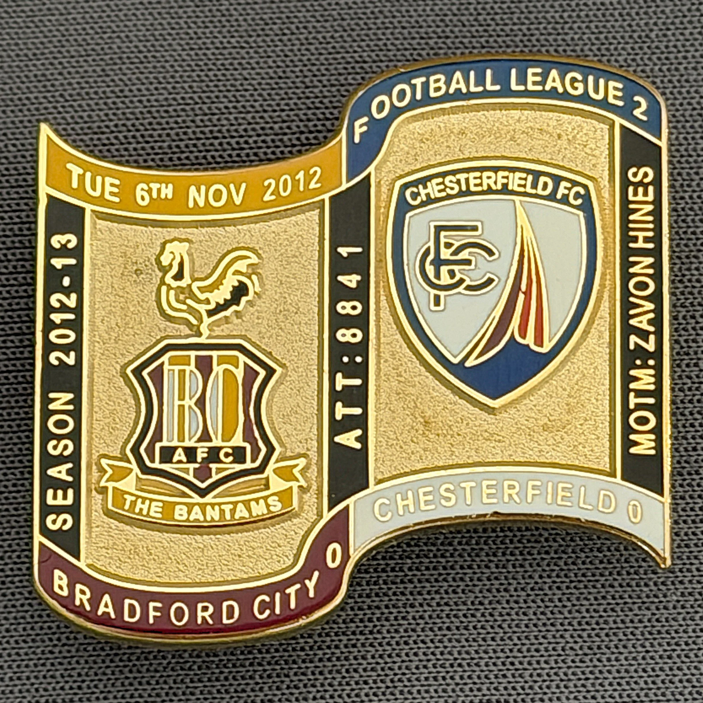 Reference Number: BCFIX123
Size: H 26.9 mm x W 29.2 mm
Pin Type: Brooch Pin
Plating: Gold
Value: £8
Manufacturer: Bradford City Badges
Comments: Bradford City v Chesterfield 2012/13 Limited Edition 65 Badges