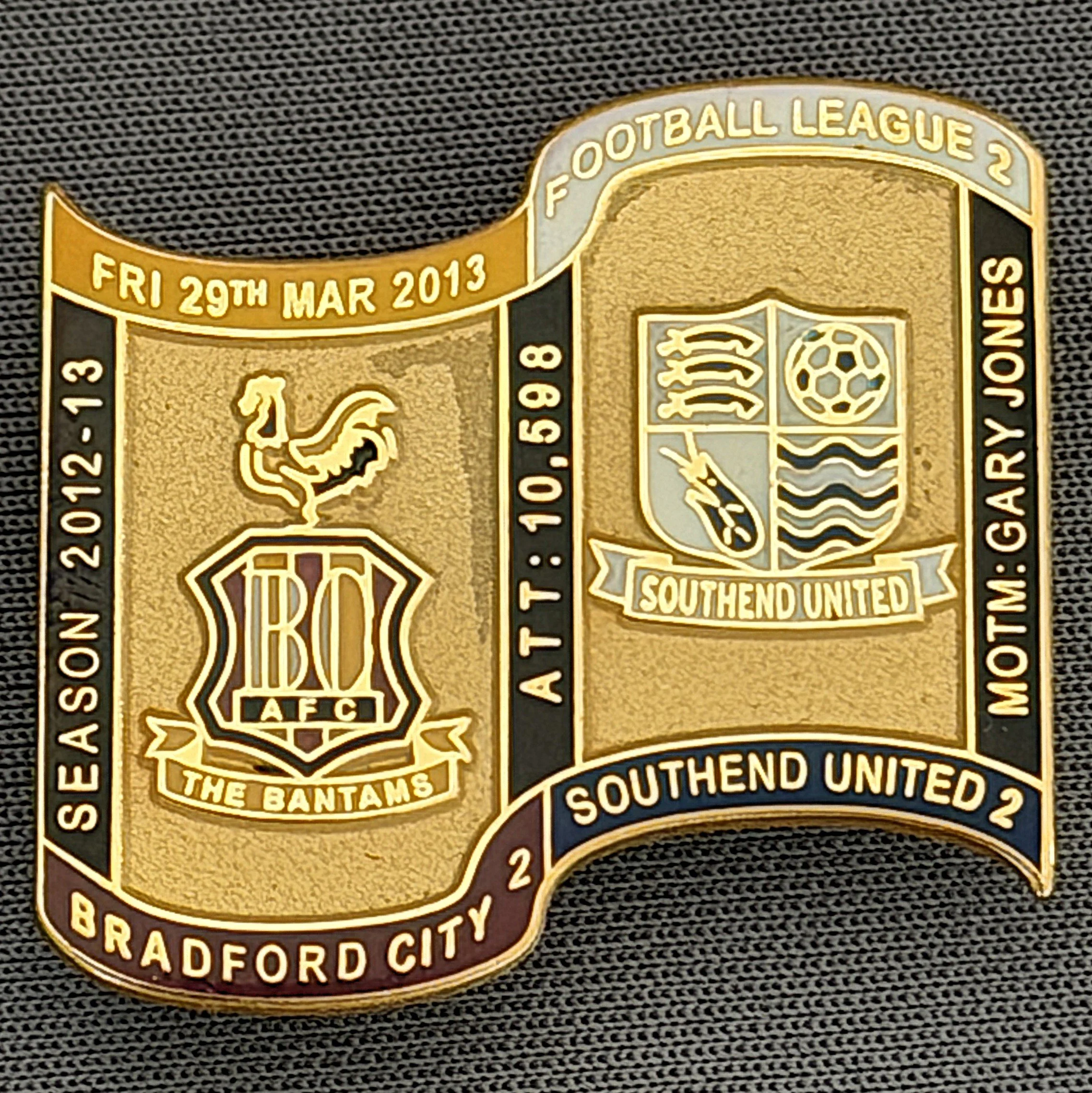 Reference Number: BCFIX134
Size: H 26.9 mm x W 29.2 mm
Pin Type: Brooch Pin
Plating: Gold
Value: £8
Manufacturer: Bradford City Badges
Comments: Bradford City v Southend United 2012/13 Limited Edition 65 Badges