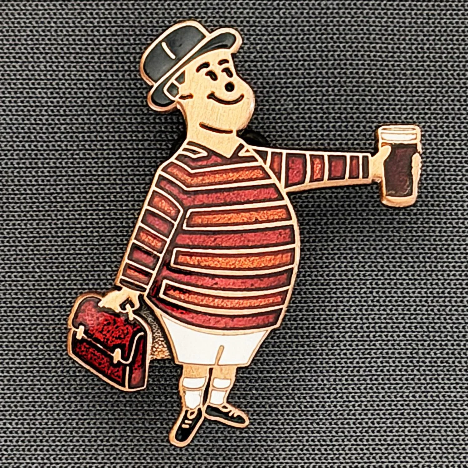Reference Number: BCGEN064
Size: H 28.8 mm x W 20.9 mm
Pin Type: Brooch Pin
Plating: Antique Copper
Value: £20
Manufacturer: Bradford City Badges
Comments: City Gent Beer Cloisonne, Claret Briefcase. One Off Badge.