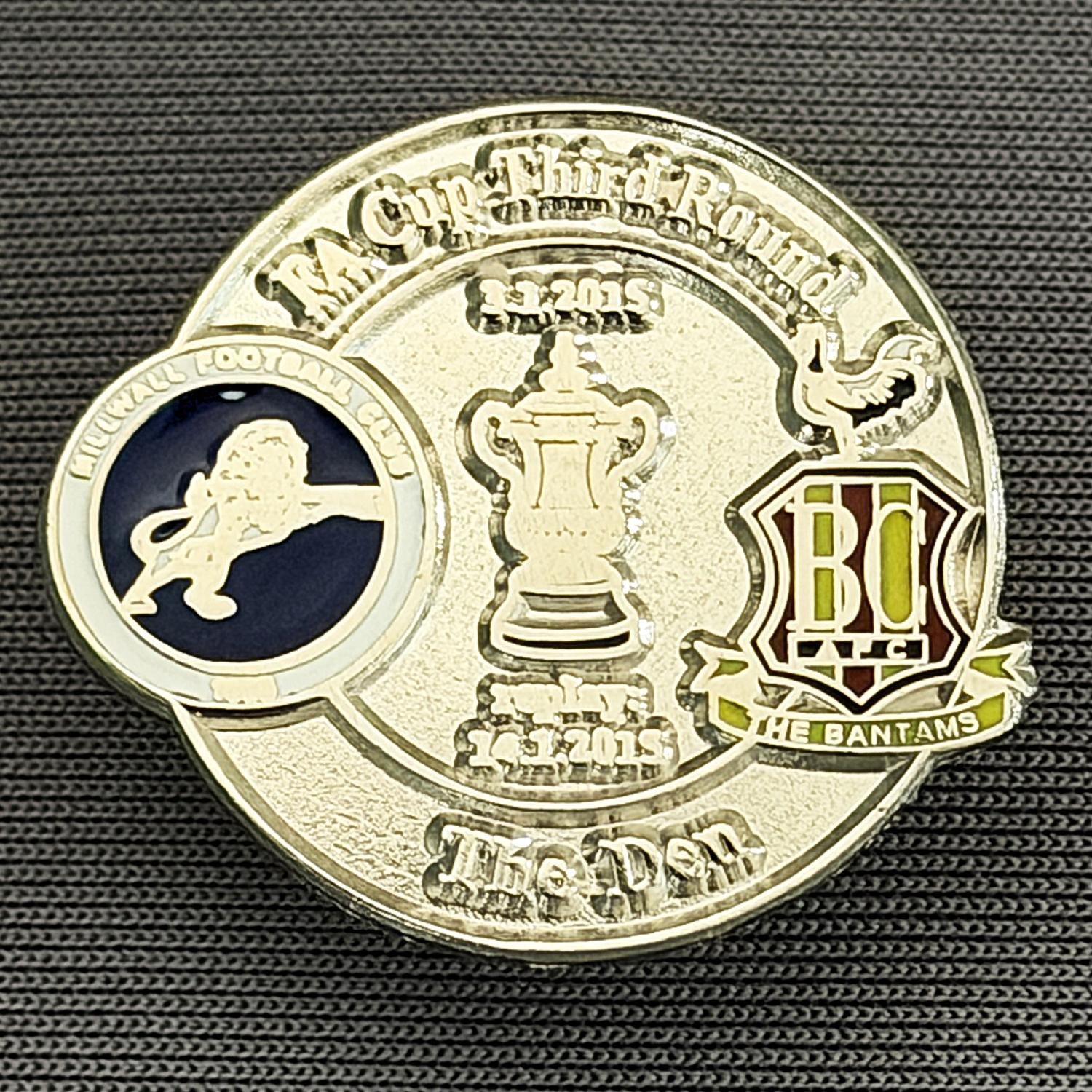 Reference Number: BCFAC084
Size: H 22.7 mm x W 26 mm
Pin Type: Metal Clutch
Plating: Silver
Value: £4
Manufacturer: Dan Lloyd
Comments: F.A. Cup Third Round 2014/15, Away v Millwall, Silver Version