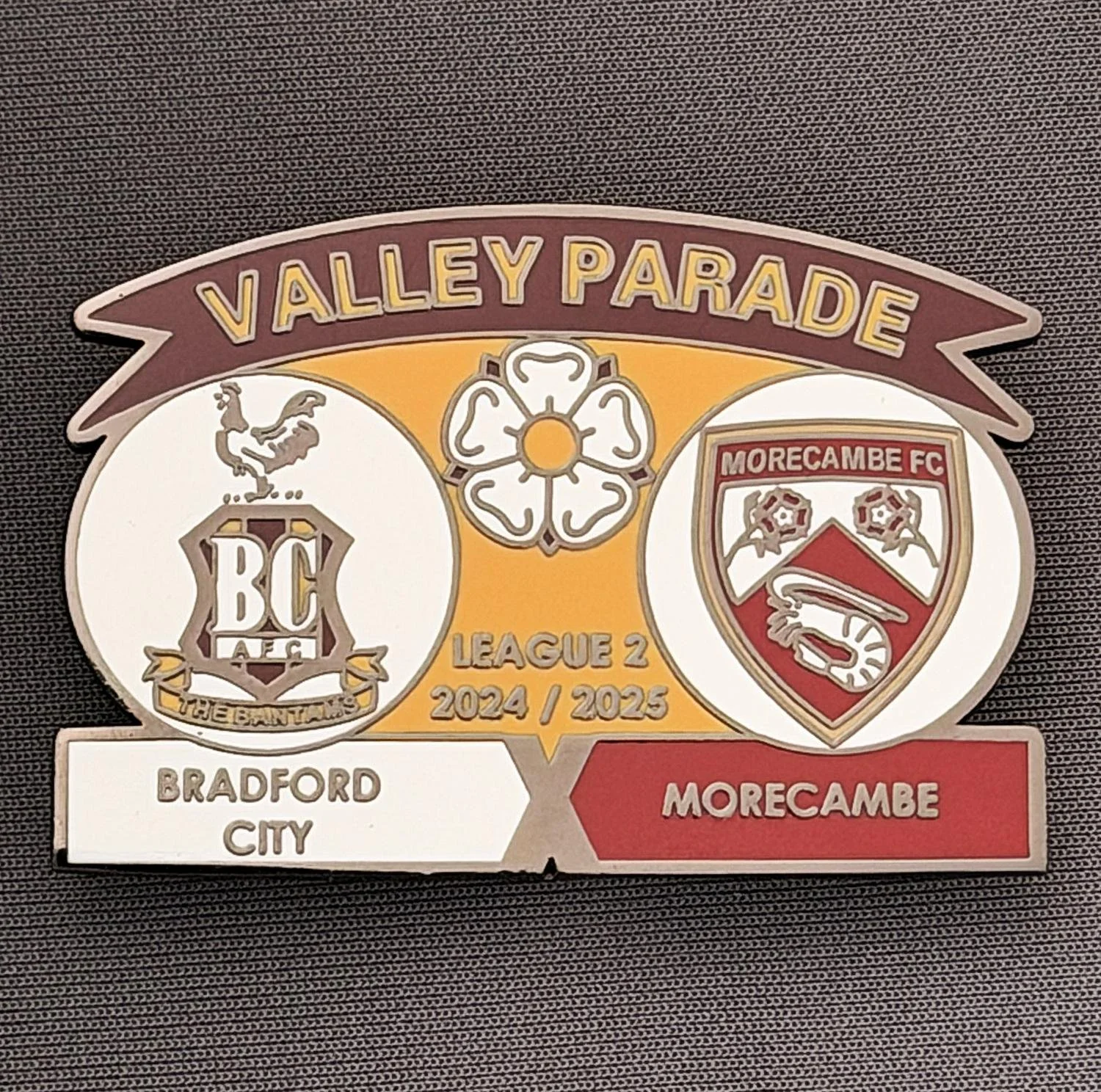 Reference Number: BCFIX429
Size: H 34.3 mm x W 50 mm
Pin Type: Brooch Pin
Plating: Black Nickel
Value: £5
Manufacturer: Unknown
Comments: Bradford City v Morecambe 2024/25.