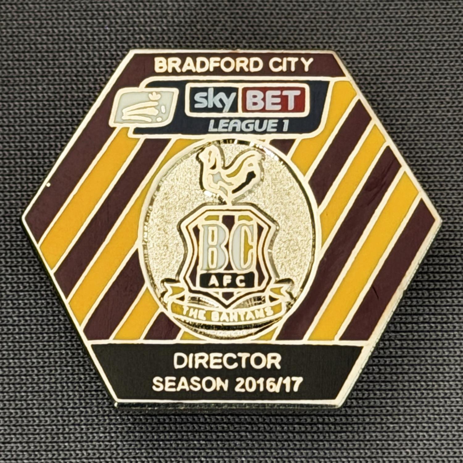 Reference Number: BCDIR012
Size: H 25.7 mm x W 29.5 mm
Pin Type: Brooch Pin
Plating: Nickel
Value: £40
Manufacturer: Bradford City Badges
Comments: Worn by C.E.O. & Directors