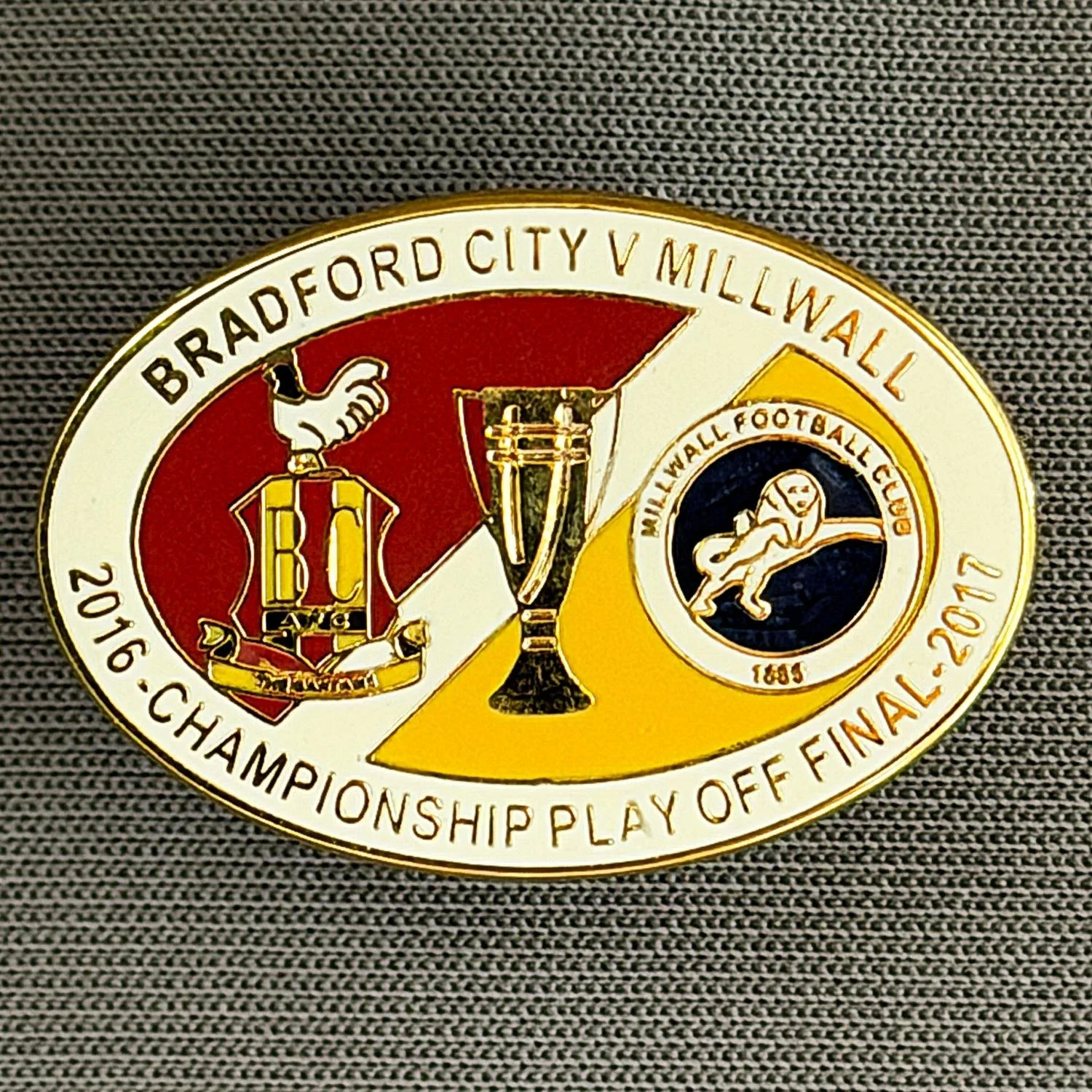 Reference Number: BCOFIX042
Size: H 17.9 mm x W 26 mm
Pin Type: Rubber Clutch
Plating: Gold
Value: £6
Manufacturer: Tricky's Pins
Comments: Play Off Final City v Millwall 2017, White, Claret & Amber Version