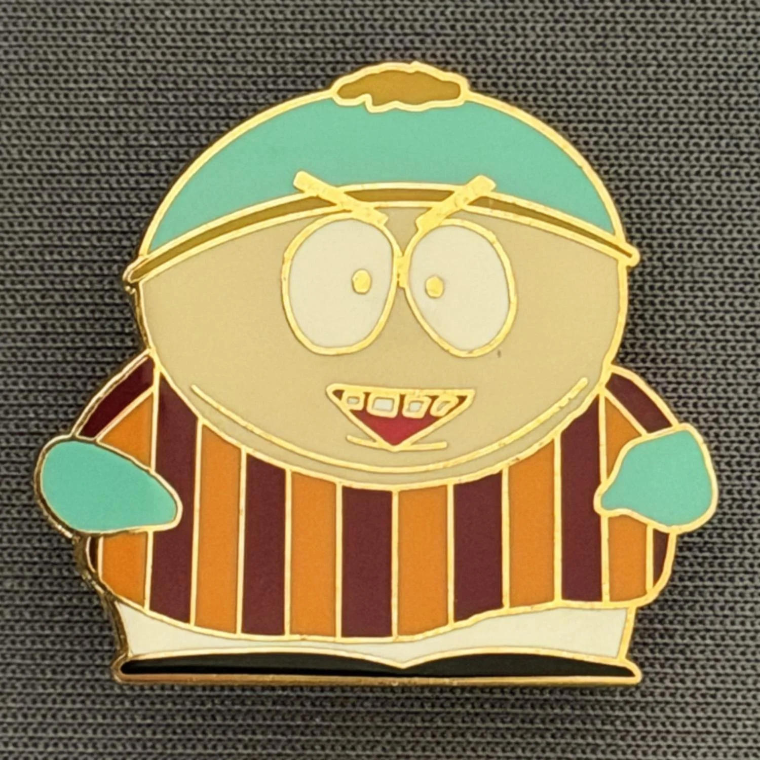 Reference Number: BCCTN015
Size: H 25.2 mm x W 27.9 mm
Pin Type: Brooch Pin
Plating: Gold
Value: £6
Manufacturer: Not Known
Comments: Eric Cartman South Park in Bradford City Kit