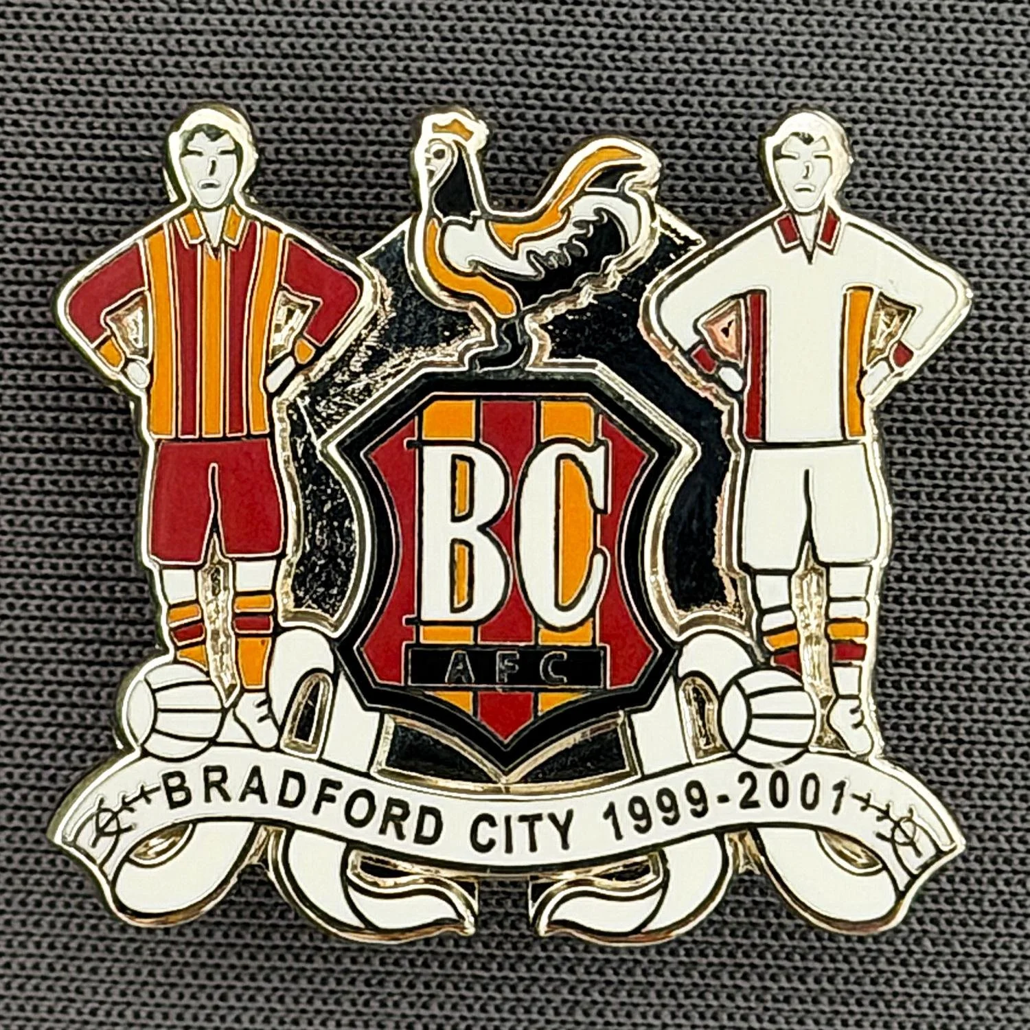 Reference Number: BCEVE063
Size: H 23 mm x W 25.3 mm
Pin Type: Brooch Pin
Plating: Silver
Value: £8
Manufacturer: Paraders
Comments: Bradford City 1999-2001