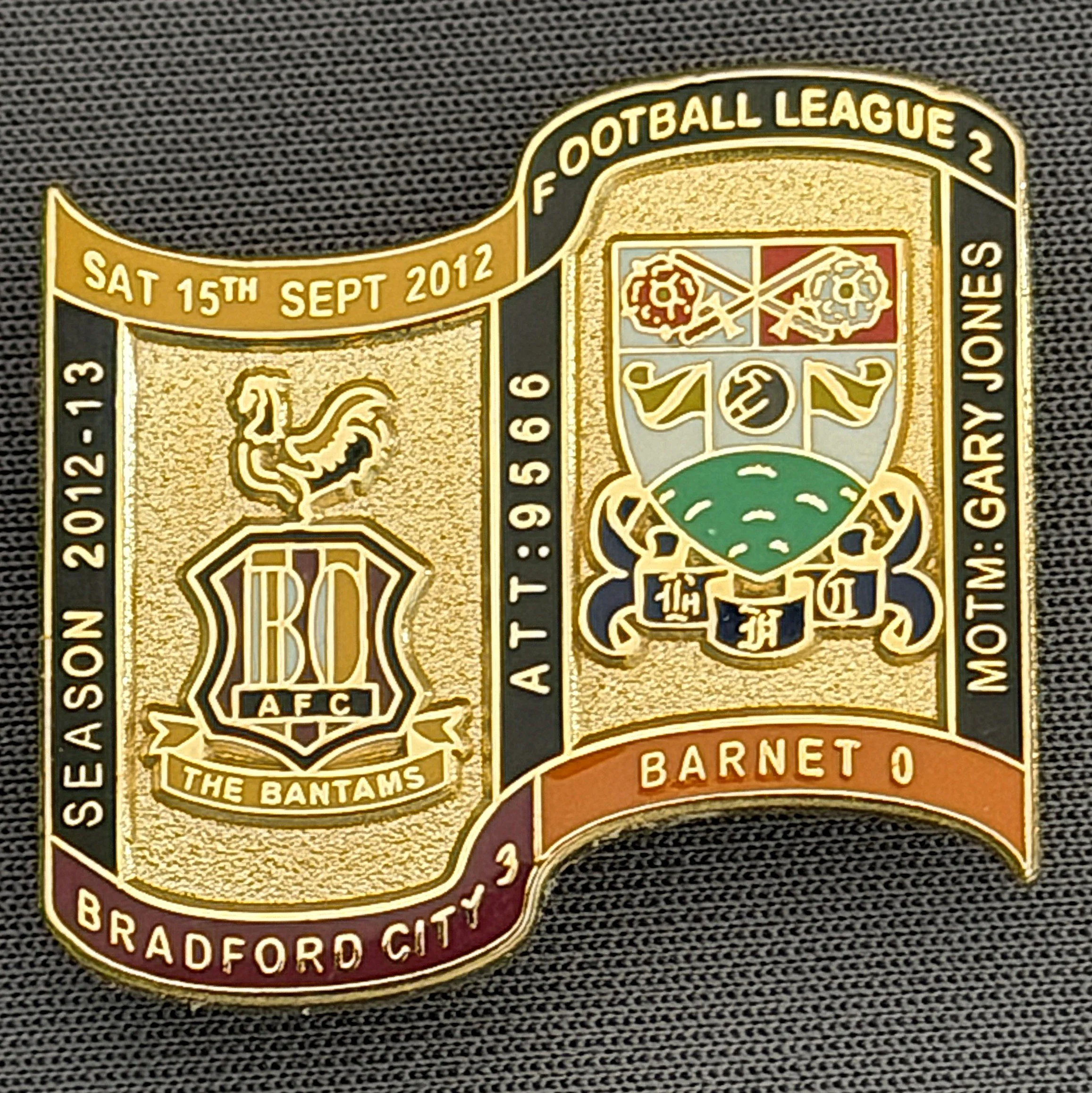 Reference Number: BCFIX118
Size: H 26.9 mm x W 29.2 mm
Pin Type: Brooch Pin
Plating: Gold
Value: £8
Manufacturer: Bradford City Badges
Comments: Bradford City v Barnet 2012/13 Limited Edition 65 Badges