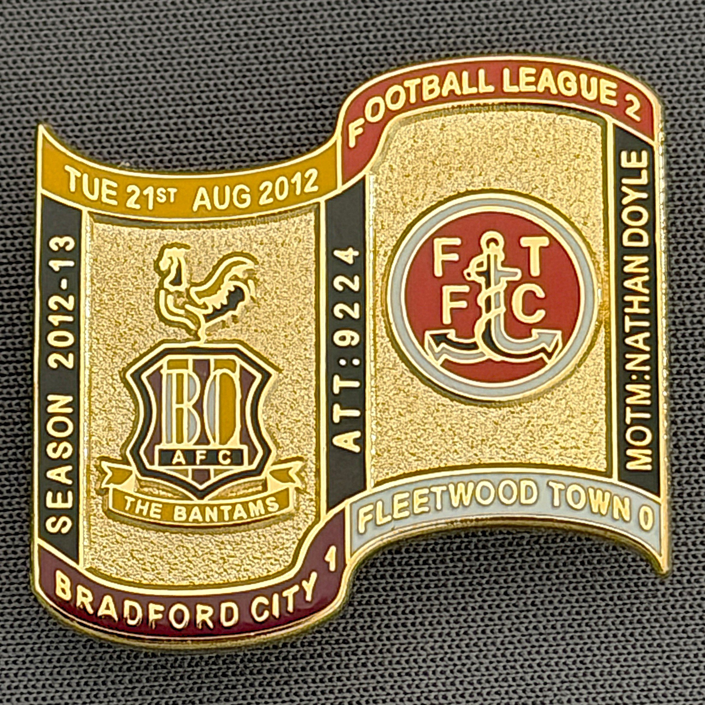 Reference Number: BCFIX116
Size: H 26.9 mm x W 29.2 mm
Pin Type: Brooch Pin
Plating: Gold
Value: £8
Manufacturer: Bradford City Badges
Comments: Bradford City v Fleetwood Town 2012/13 Limited Edition 65 Badges