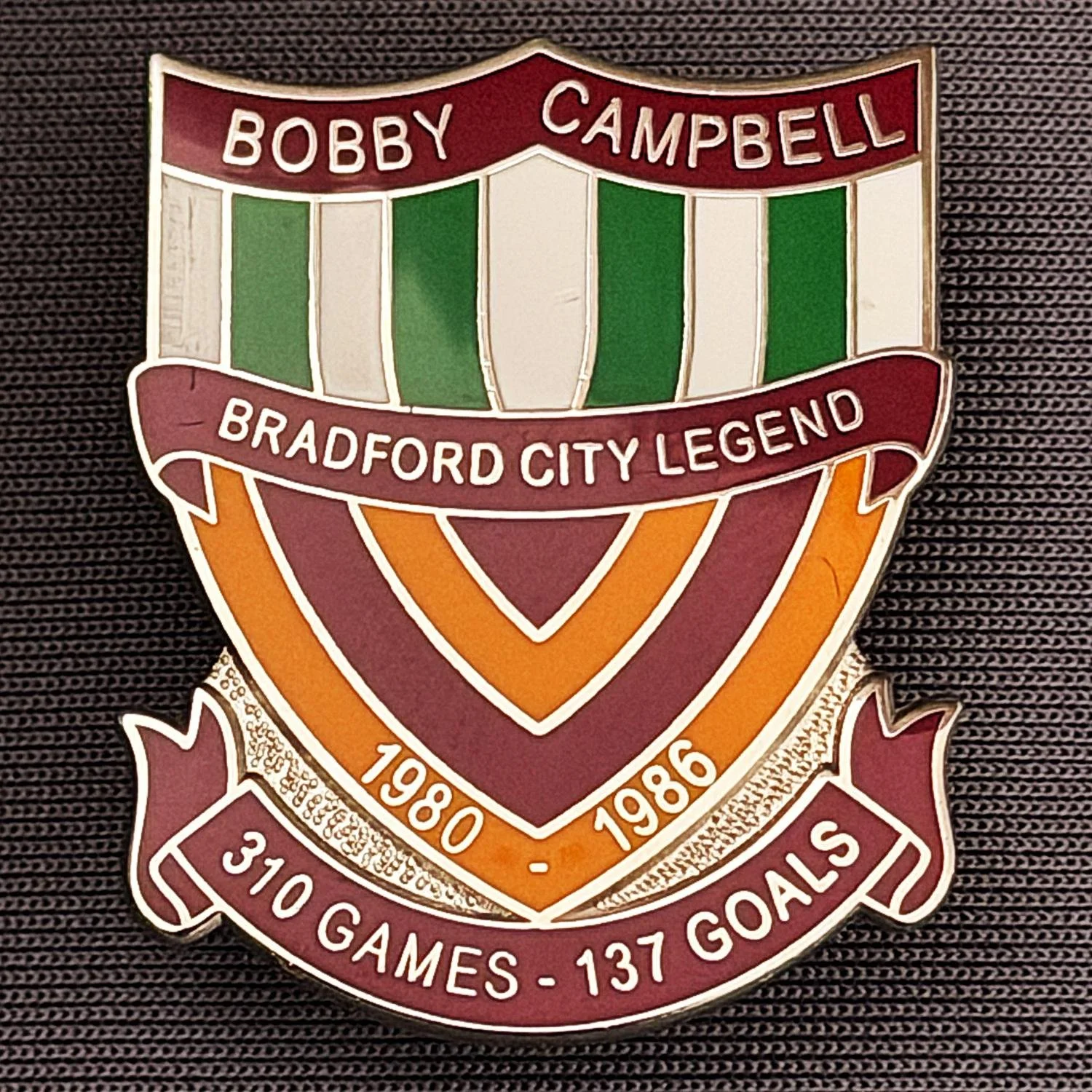 Reference Number: BCUN016
Size: H 32 mm x W 25.9 mm
Pin Type: Metal Clutch
Plating: Silver
Value: £10
Manufacturer: Bradford City Badges
Comments: Bobby Campbell Limited Edition of 25. Boxed Set of 4. Issued 2012. Claret, Green, White & Amber Version