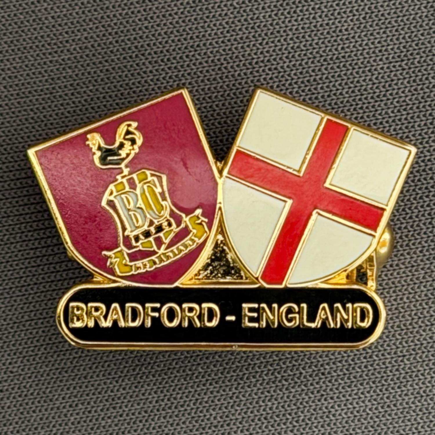 Reference Number: BCFLA029
Size: H 17.3 mm x W 25.5 mm
Pin Type: Brooch Pin
Plating: Gold
Value: £6
Manufacturer: Not Known
Comments: City Crest & St George Crest Bradford England Black Version