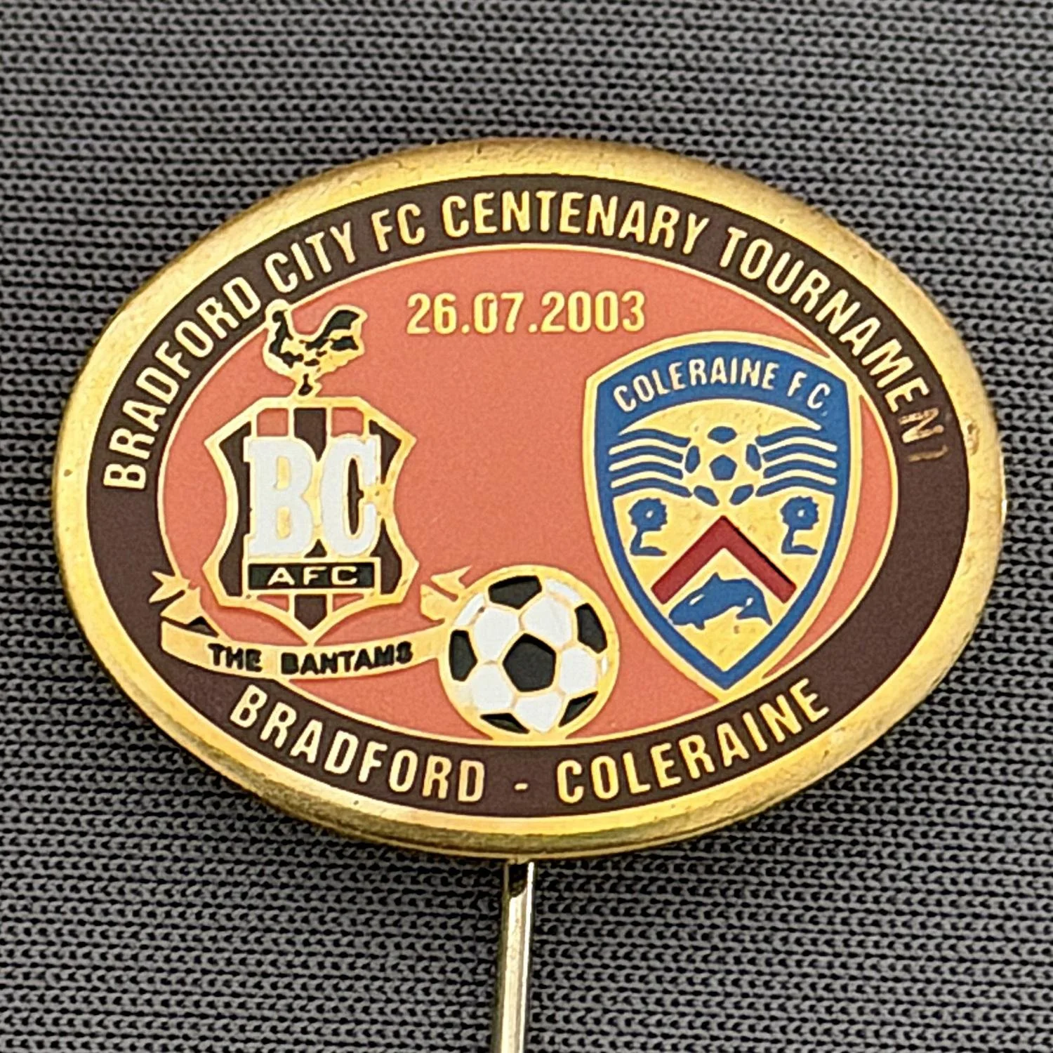 Reference Number: BCEVE020
Size: H 19.2 mm x W 24.9 mm
Pin Type: Stick Pin
Plating: Brass
Value: £12
Manufacturer: Russian
Comments: City v Coleraine, Centenary Tournament 2003, Claret & Amber