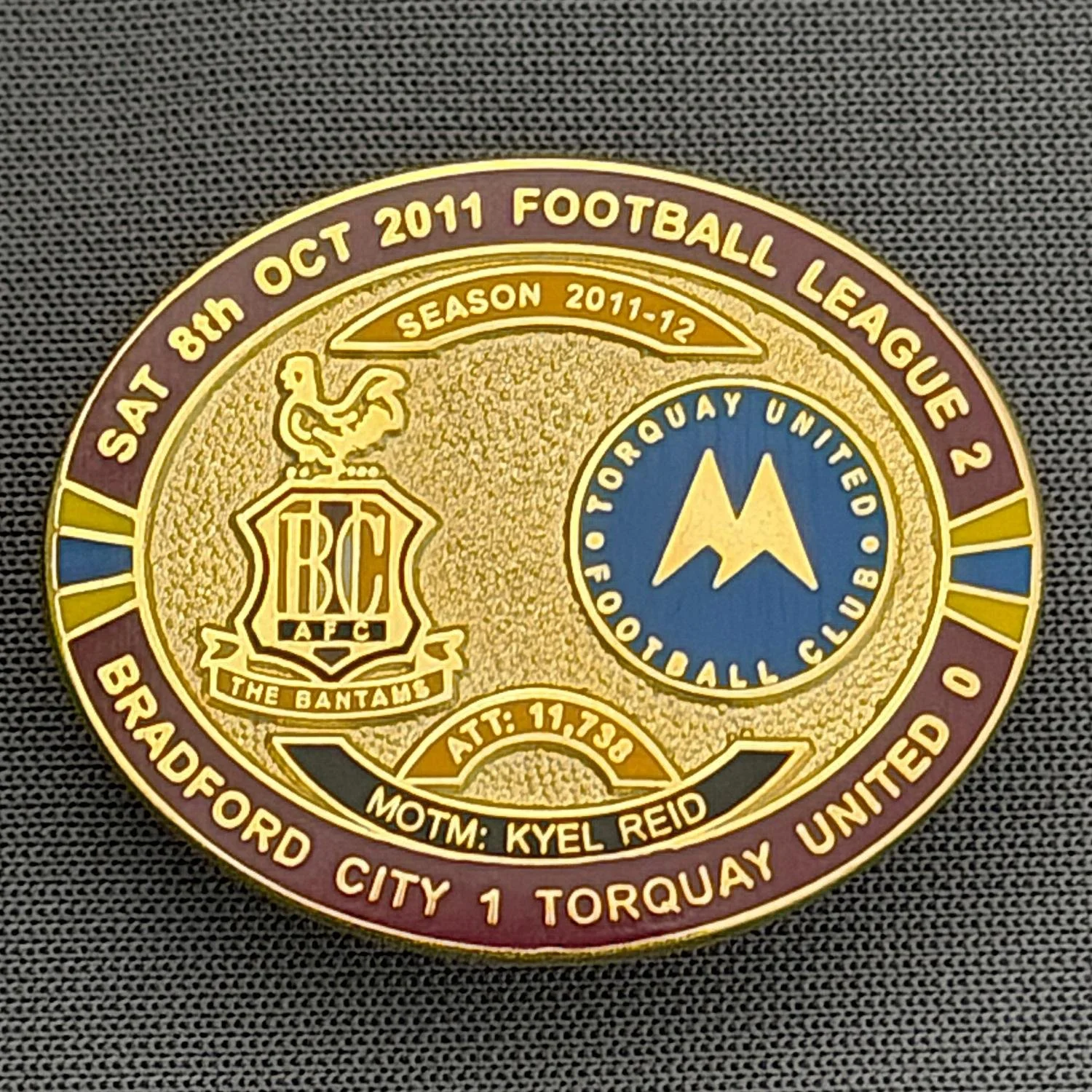 Reference Number: BCFIX075
Size: H 23.6 mm x W 28.7 mm
Pin Type: Brooch Pin
Plating: Gold
Value: £8
Manufacturer: Bradford City Badges
Comments: Bradford City v Torquay United  2011/12 Limited Edition 80 Badges
