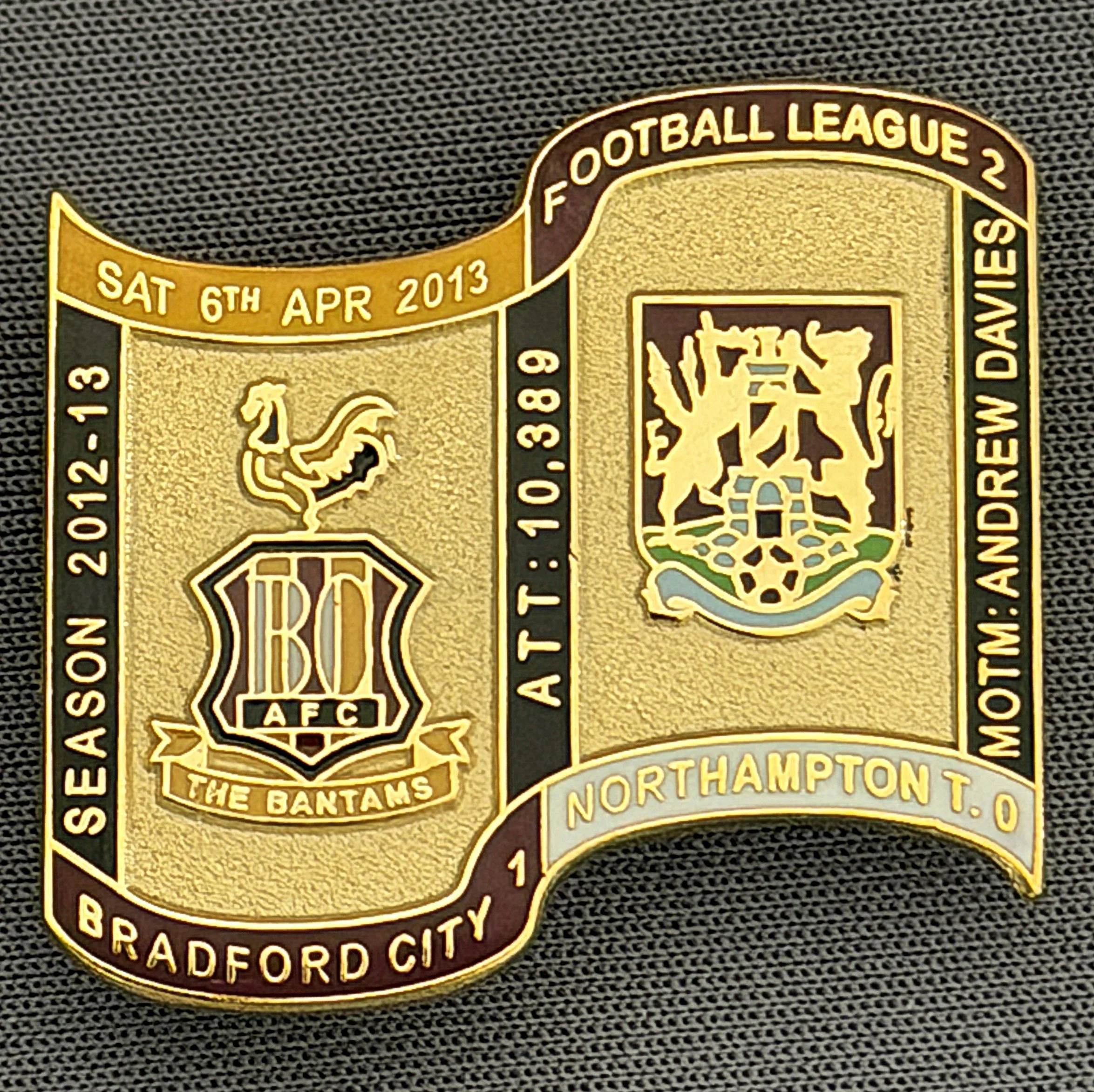 Reference Number: BCFIX135
Size: H 26.9 mm x W 29.2 mm
Pin Type: Brooch Pin
Plating: Gold
Value: £8
Manufacturer: Bradford City Badges
Comments: Bradford City v Northampton Town 2012/13 Limited Edition 65 Badges