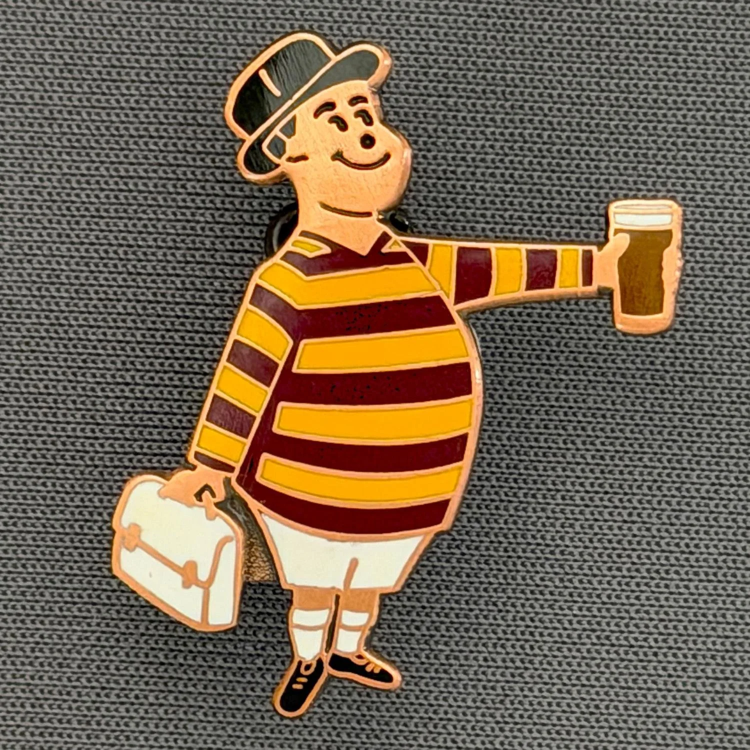 Reference Number: BCGEN089
Size: H 28.8 mm x W 20.9 mm
Pin Type: Brooch Pin
Plating: Antique Copper
Value: £20
Manufacturer: Bradford City Badges
Comments: City Gent Beer, White Briefcase. One Off Badge.