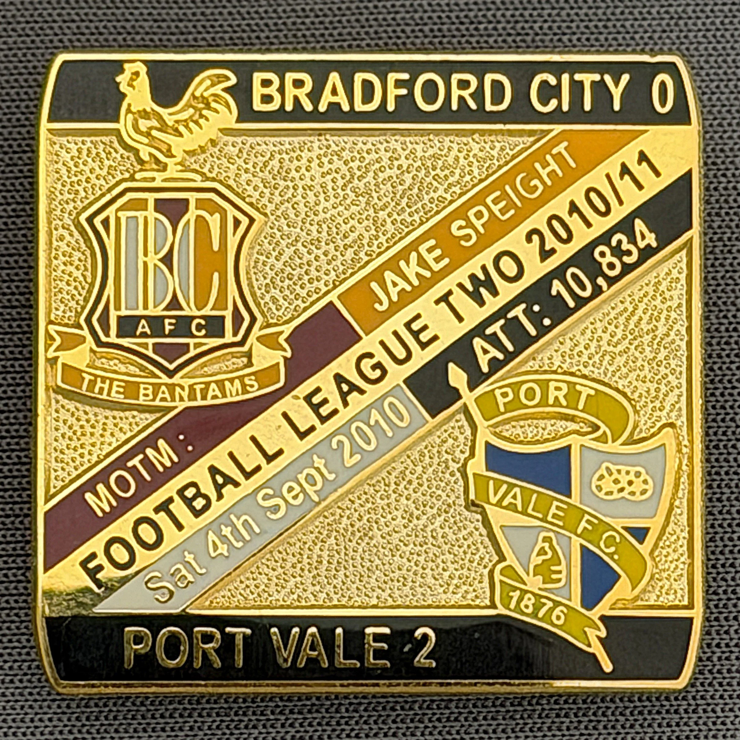 Reference Number: BCFIX049
Size: H 28.3 mm x W 29.3 mm
Pin Type: Brooch Pin
Plating: Gold
Value: £8
Manufacturer: Bradford City Badges
Comments: Bradford City v Port Vale 2010/11 Limited Edition 100 Badges