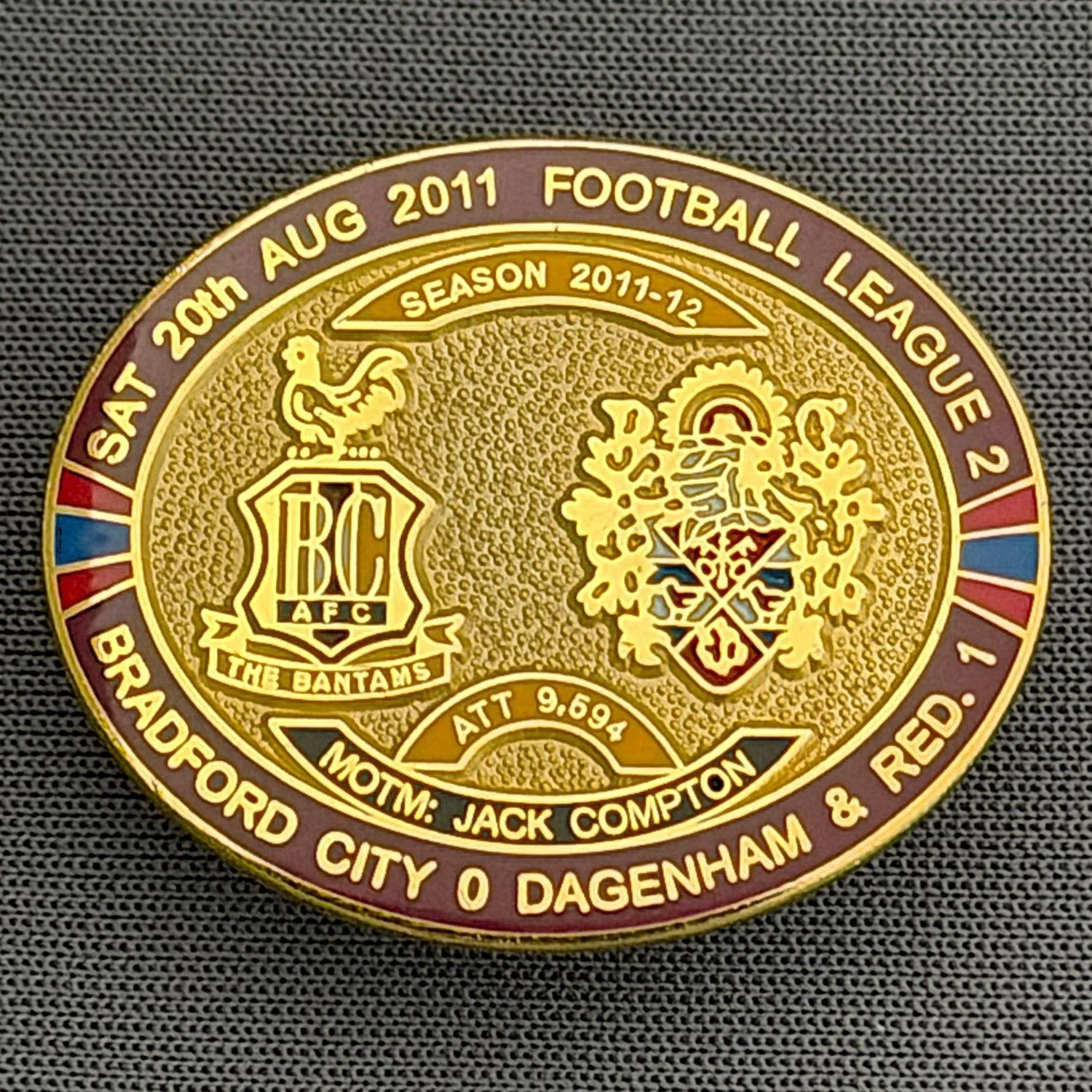 Reference Number: BCFIX071
Size: H 23.6 mm x W 28.7 mm
Pin Type: Brooch Pin
Plating: Gold
Value: £8
Manufacturer: Bradford City Badges
Comments: Bradford City v Dagenham & Redbridge  2011/12 Limited Edition 80 Badges