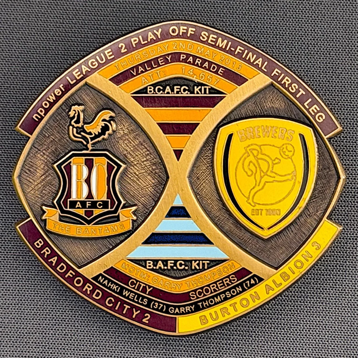 Reference Number: BCOFIX007
Size: H 40 mm x W 42.1 mm
Pin Type: Brooch Pin
Plating: Antique Gold
Value: £12
Manufacturer: Bradford City Badges
Comments: League 2 Semi Final Play Off 1st Leg v Burton Albion 2013, Limited Edition 6
