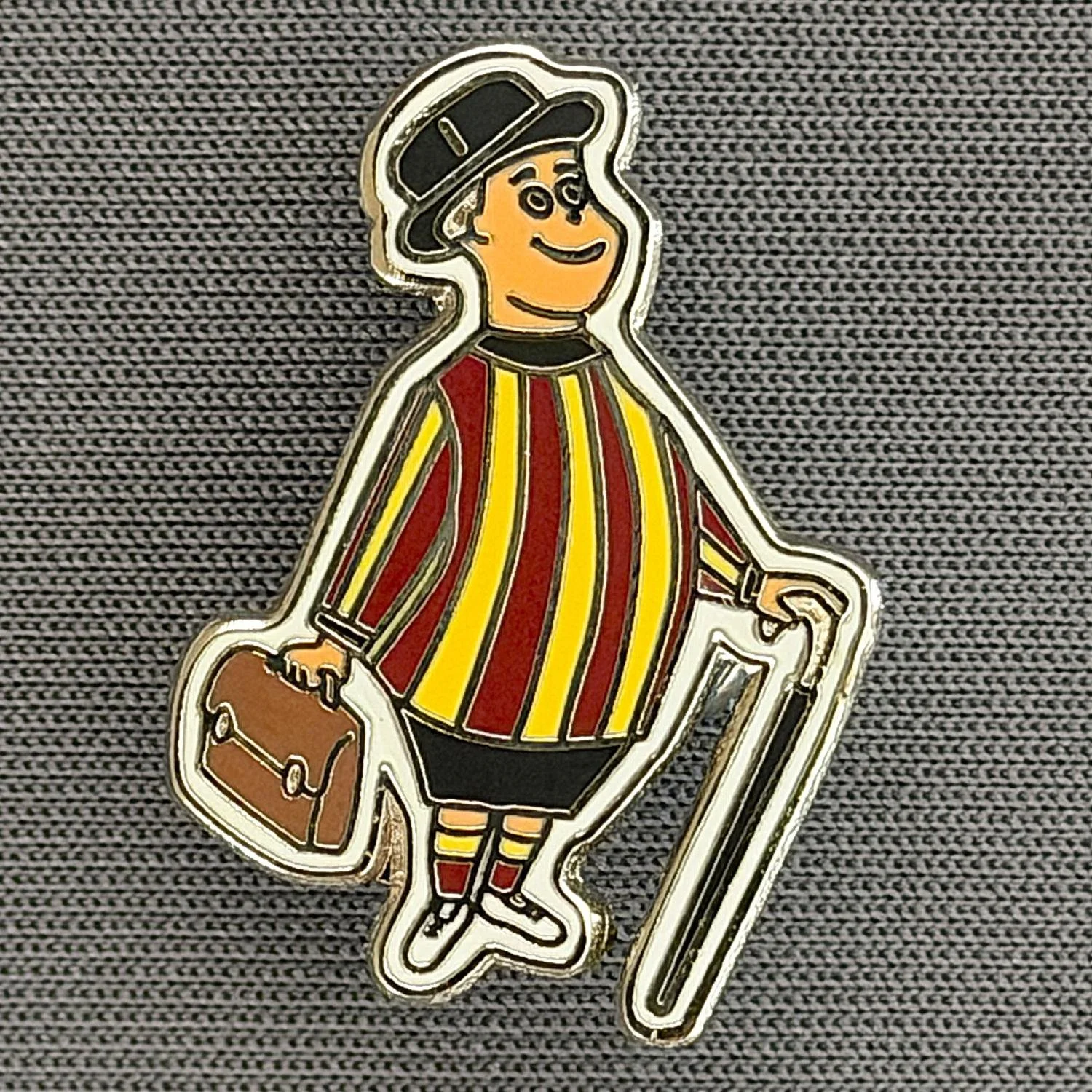 Reference Number: BCGEN102
Size: H 24 mm x W 17.6 mm
Pin Type: Brooch Pin
Plating: Silver
Value: £6
Manufacturer: Unknown
Comments: City Gent, White Outline, Black Shorts