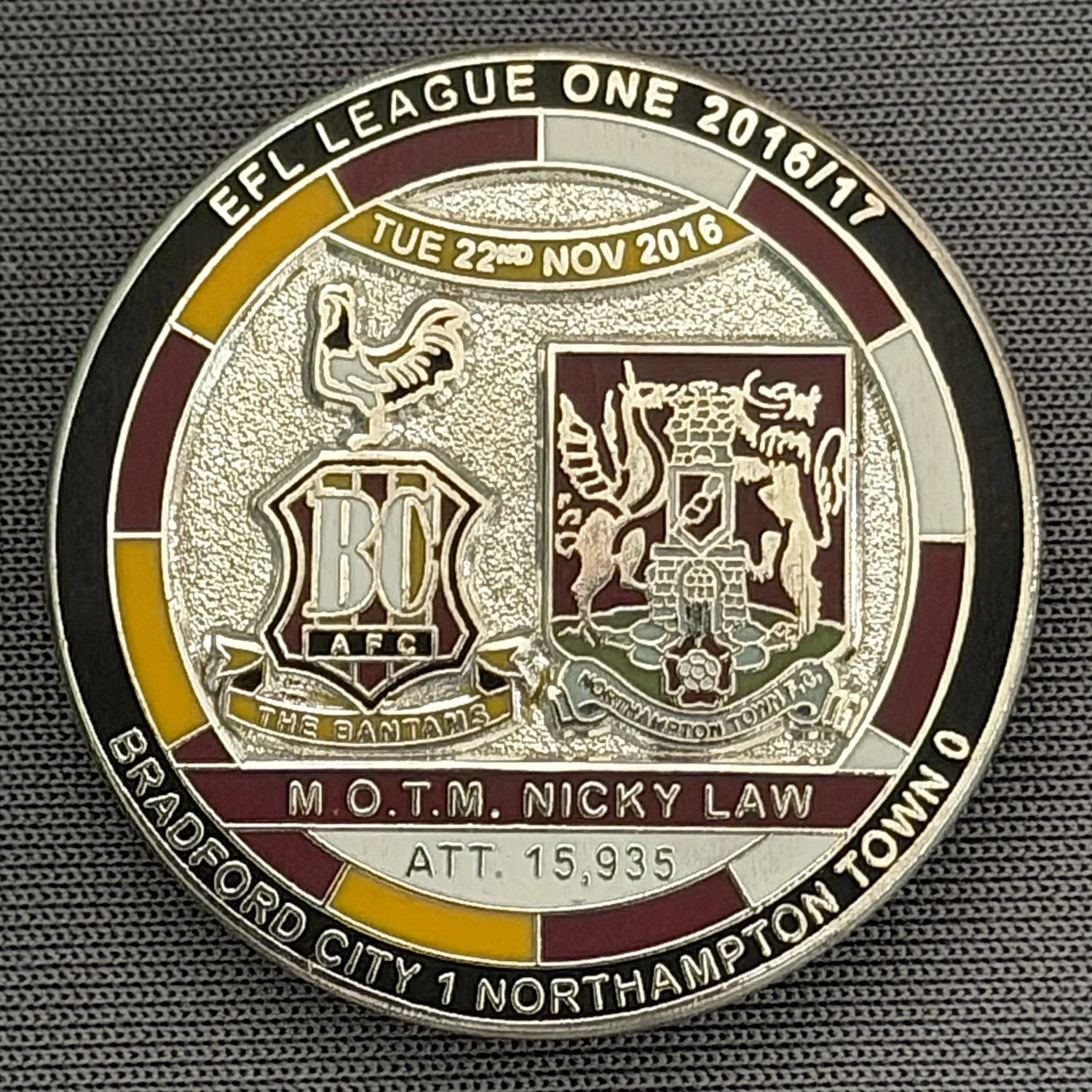 Reference Number: BCFIX401
Size: D 29.4 mm
Pin Type: Brooch Pin
Plating: Nickel
Value: £10
Manufacturer: Bradford City Badges
Comments: Bradford City v Northampton Town 2016/17, Limited Edition of 10 Badges (Nickel Version)