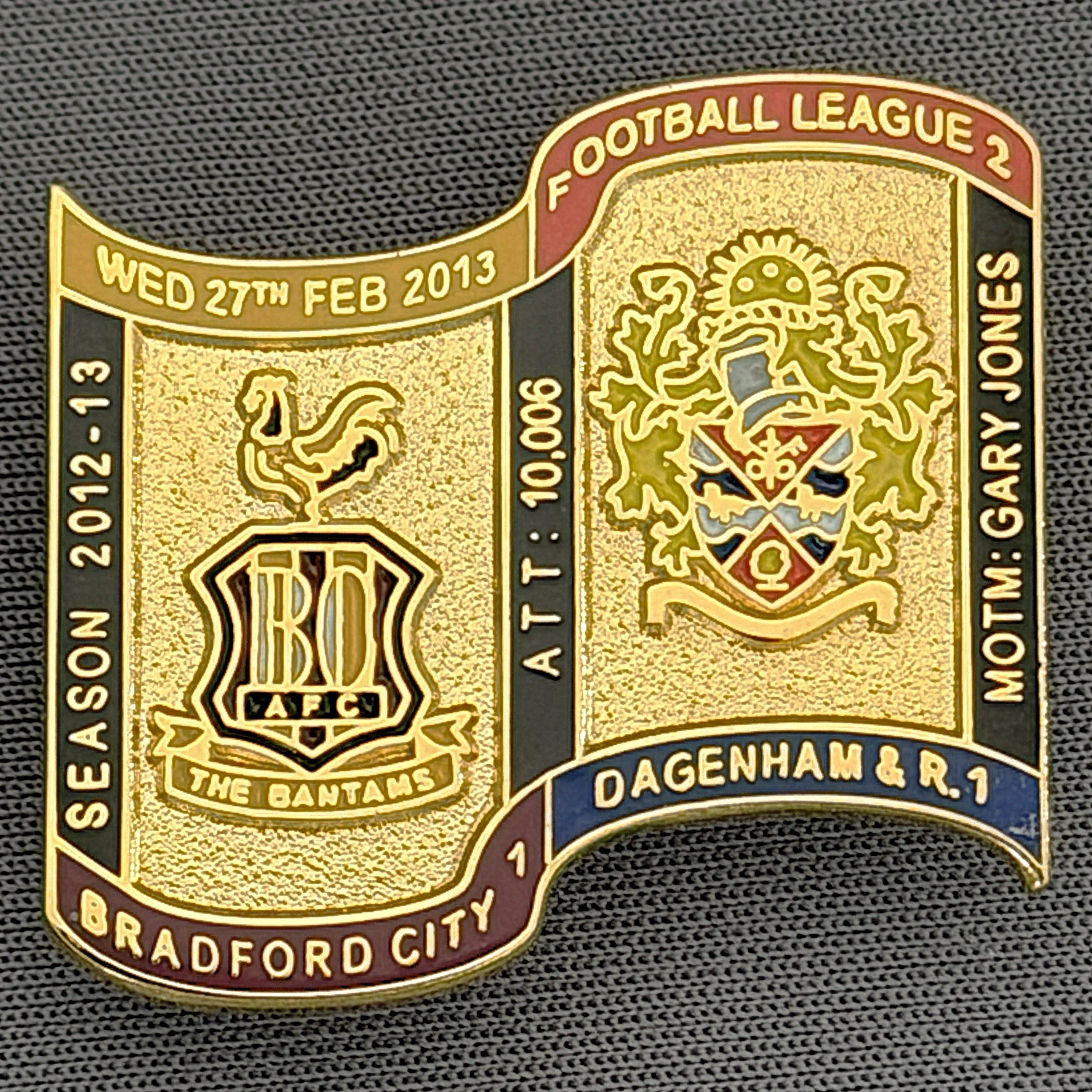 Reference Number: BCFIX131
Size: H 26.9 mm x W 29.2 mm
Pin Type: Brooch Pin
Plating: Gold
Value: £8
Manufacturer: Bradford City Badges
Comments: Bradford City v Dagenham & Redbridge 2012/13 Limited Edition 65 Badges