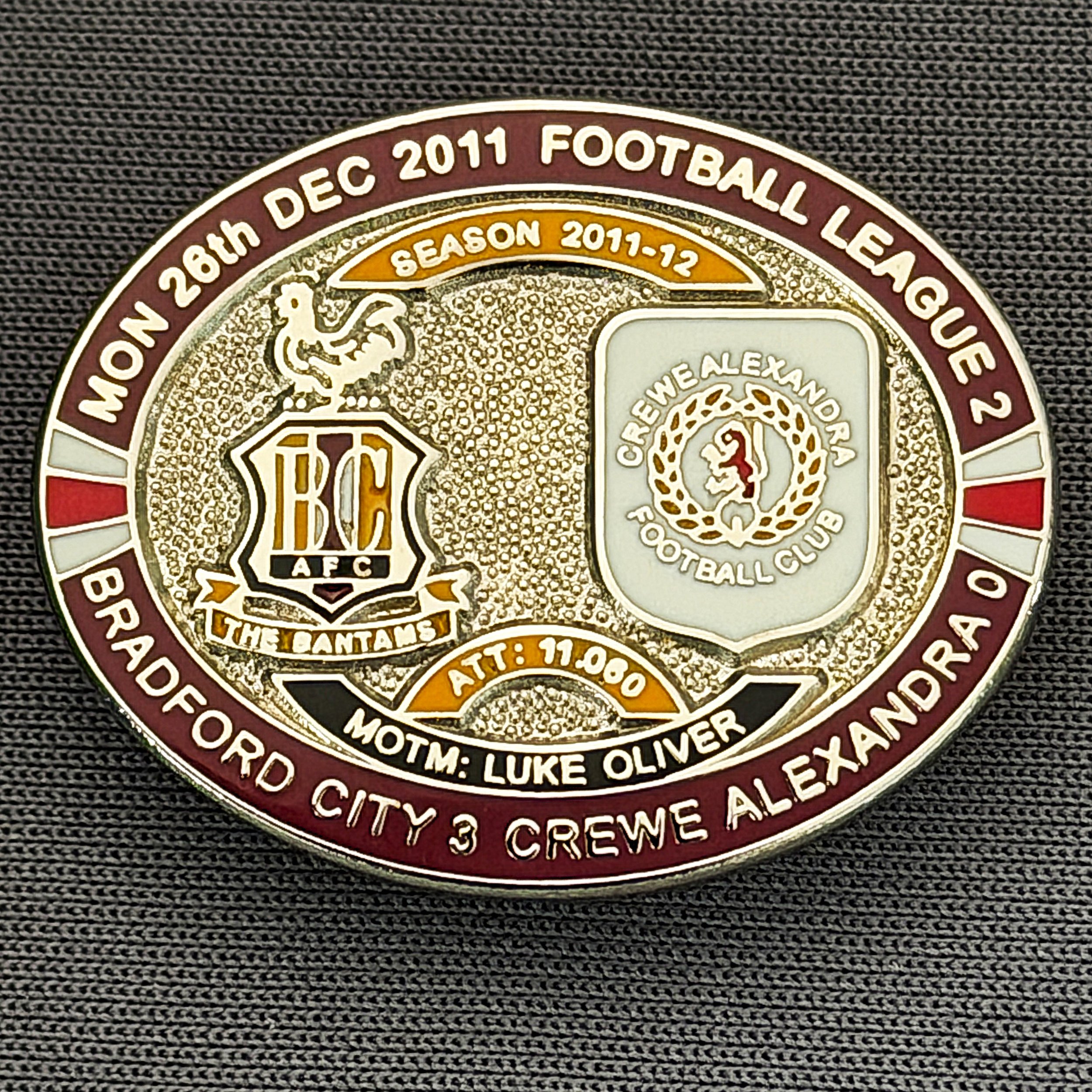 Reference Number: BCFIX103
Size: H 23.6 mm x W 28.7 mm
Pin Type: Brooch Pin
Plating: Silver
Value: £10
Manufacturer: Bradford City Badges
Comments: Bradford City v Crew Alexandra 2011/12 Limited Edition 20 Badges (Silver Version)