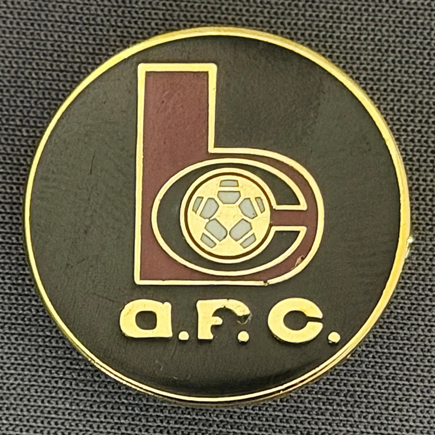 Reference Number: BCC&L133
Size: D 21.9 mm
Pin Type: Brooch Pin
Plating: Gold
Value: £6
Manufacturer: Unknown
Comments: Black BC Logo