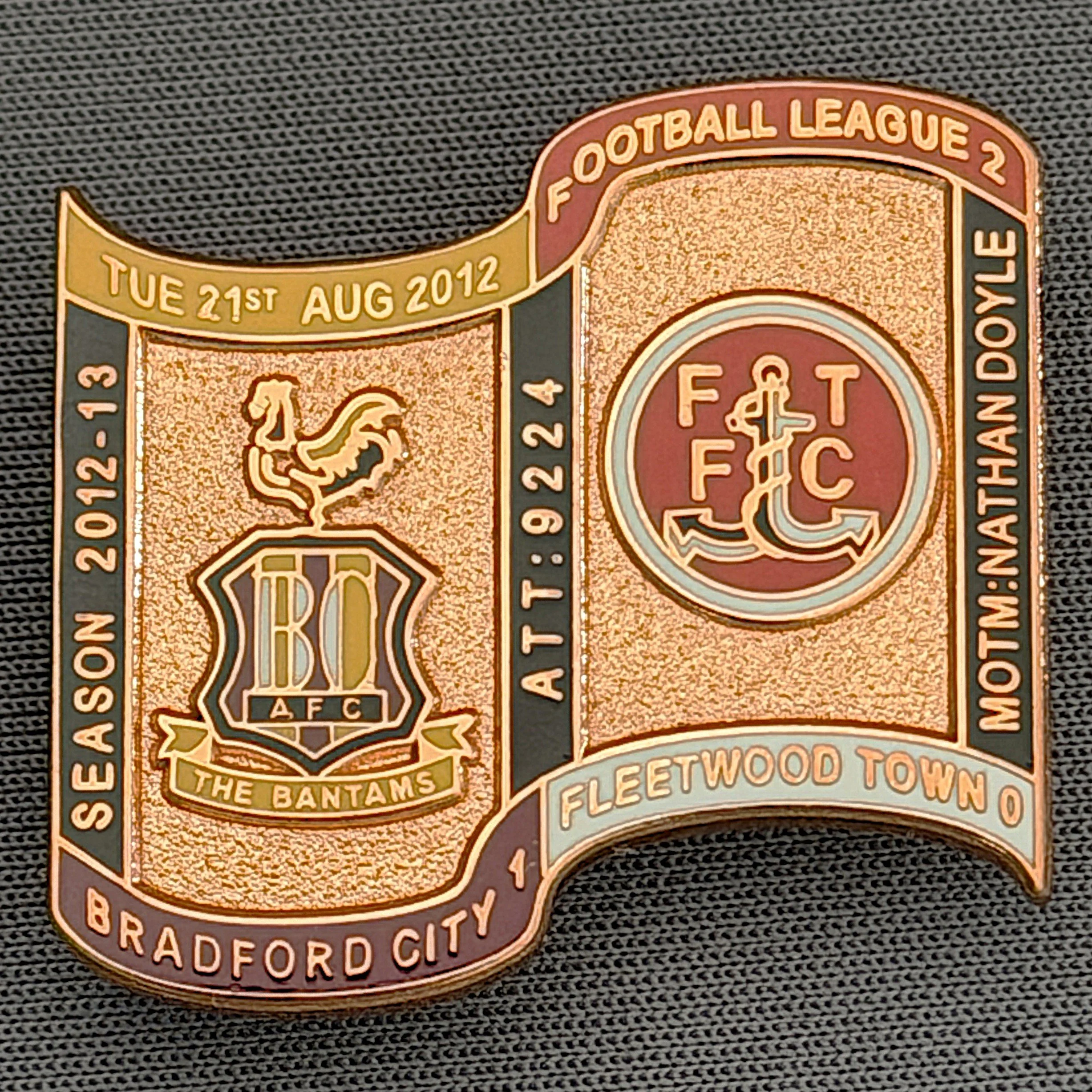 Reference Number: BCFIX162
Size: H 26.9 mm x W 29.2 mm
Pin Type: Brooch Pin
Plating: Copper
Value: £12
Manufacturer: Bradford City Badges
Comments: Bradford City v Torquay United  2012/13 Limited Edition 1 Badge (Copper Version)