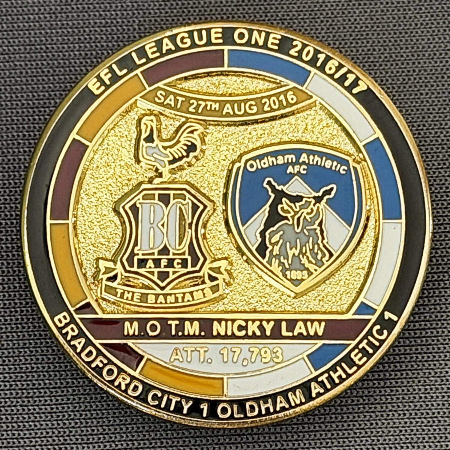 Reference Number: BCFIX371
Size: D 29.4 mm
Pin Type: Brooch Pin
Plating: Gold
Value: £8
Manufacturer: Bradford City Badges
Comments: Bradford City v Oldham Athletic 2015/16, Limited Edition of 50 Badges (Gold Version)