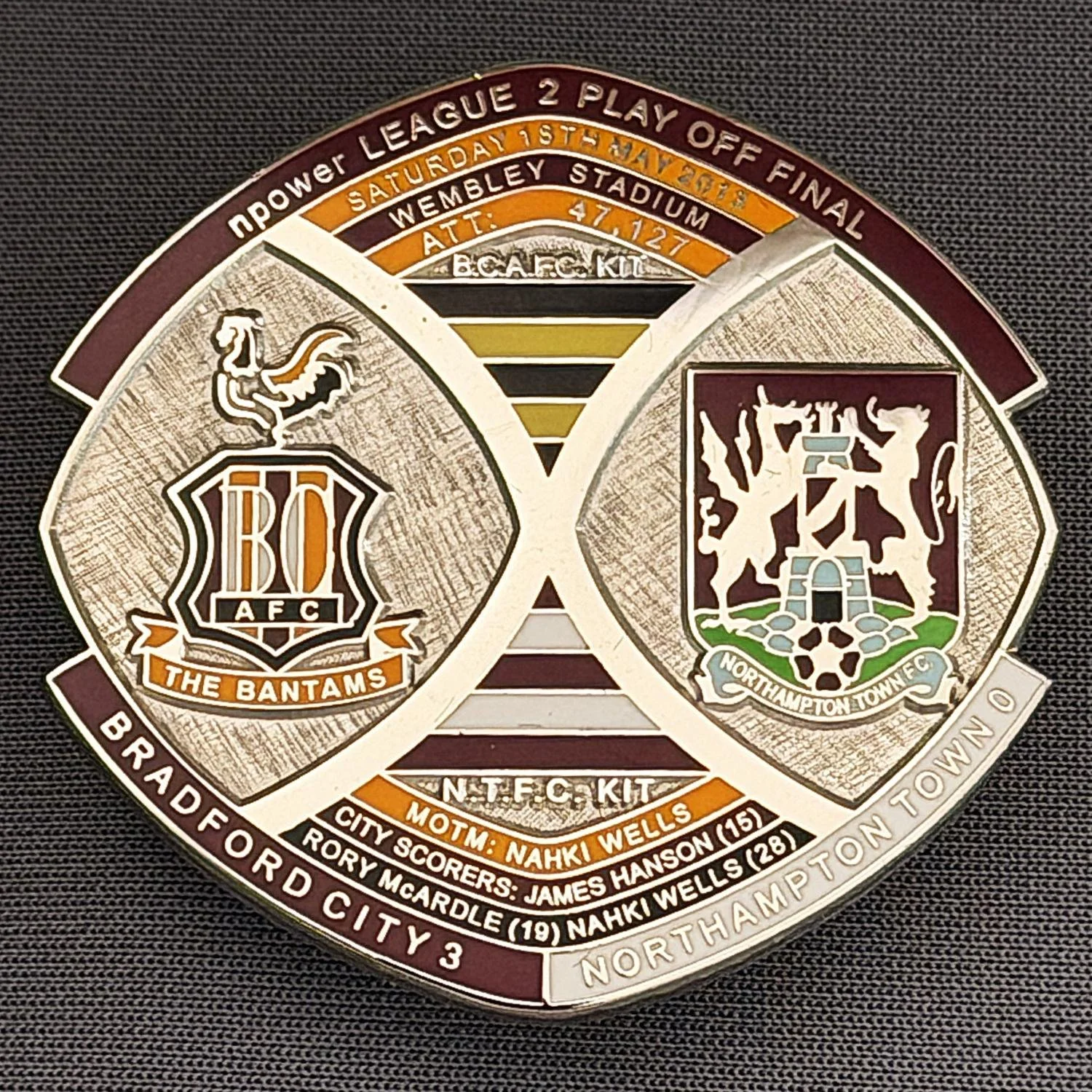 Reference Number: BCOFIX006
Size: H 40 mm x W 42.1 mm
Pin Type: Brooch Pin
Plating: Silver
Value: £10
Manufacturer: Bradford City Badges
Comments: League 2 Play Off Final v Northampton Town 2013, Limited Edition 30