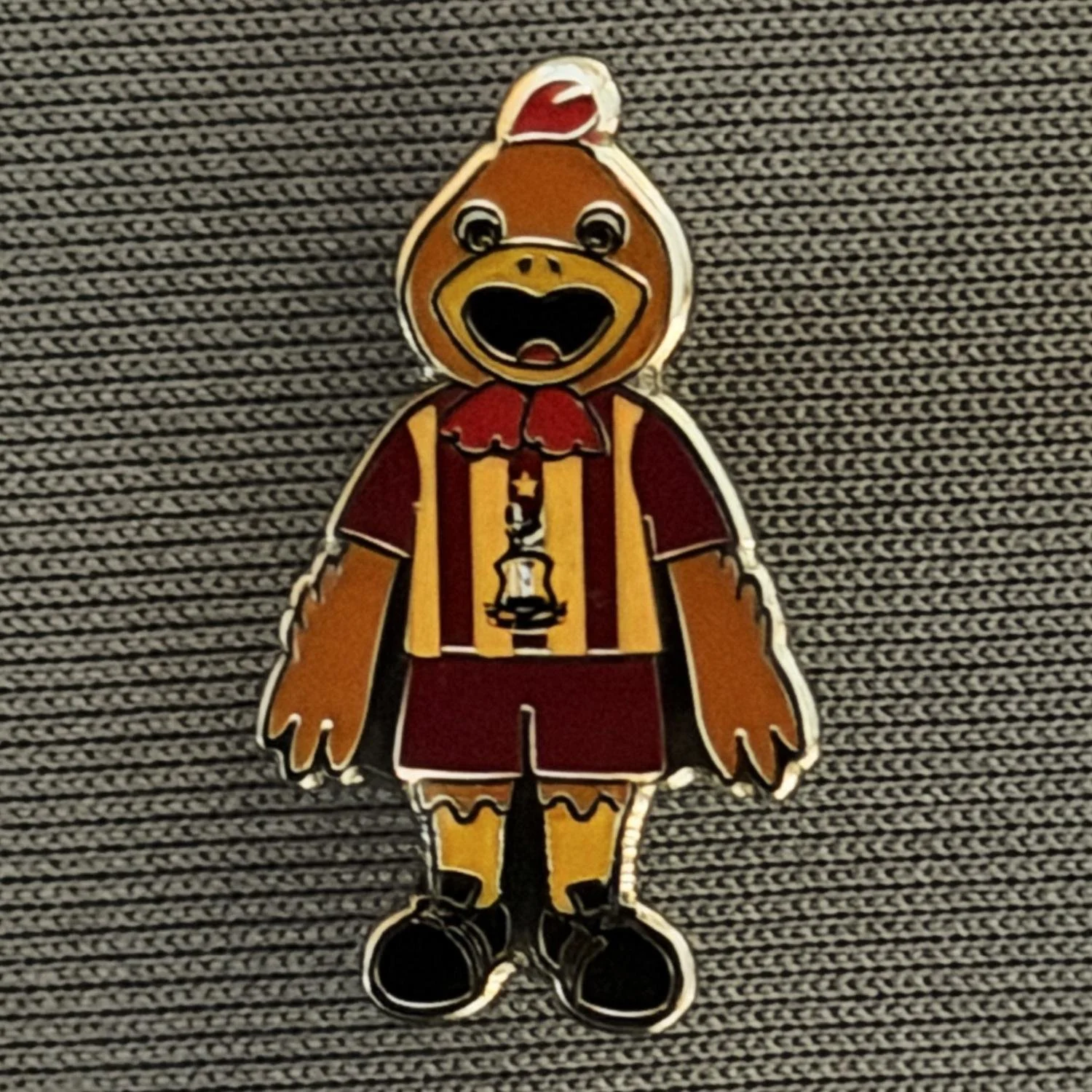 Reference Number: BCCTN062
Size: H 20.5 mm x W 12.1 mm
Pin Type: Metal Clutch
Plating: Silver
Value: £6
Manufacturer: Bradford City Shop
Comments: Billy Bantam