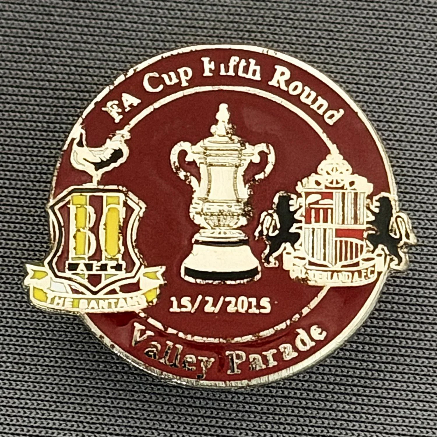 Reference Number: BCFAC101
Size: H 22.8 mm x W 25.4 mm
Pin Type: Metal Clutch
Plating: Silver
Value: £4
Manufacturer: Dan Lloyd
Comments: F.A. Cup Fifth Round 2014/15, v Sunderland, Claret Version