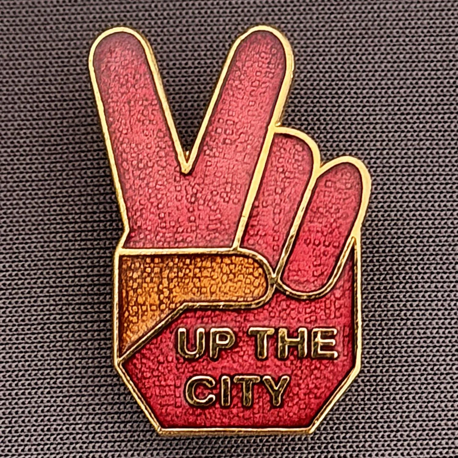 Reference Number: BCBCFC003
Size: H 25.7 mm x W 18 mm
Pin Type: Brooch Pin
Plating: Gold
Value: £12
Manufacturer: AKP Designs
Comments: Up The City, Claret & Amber Version
