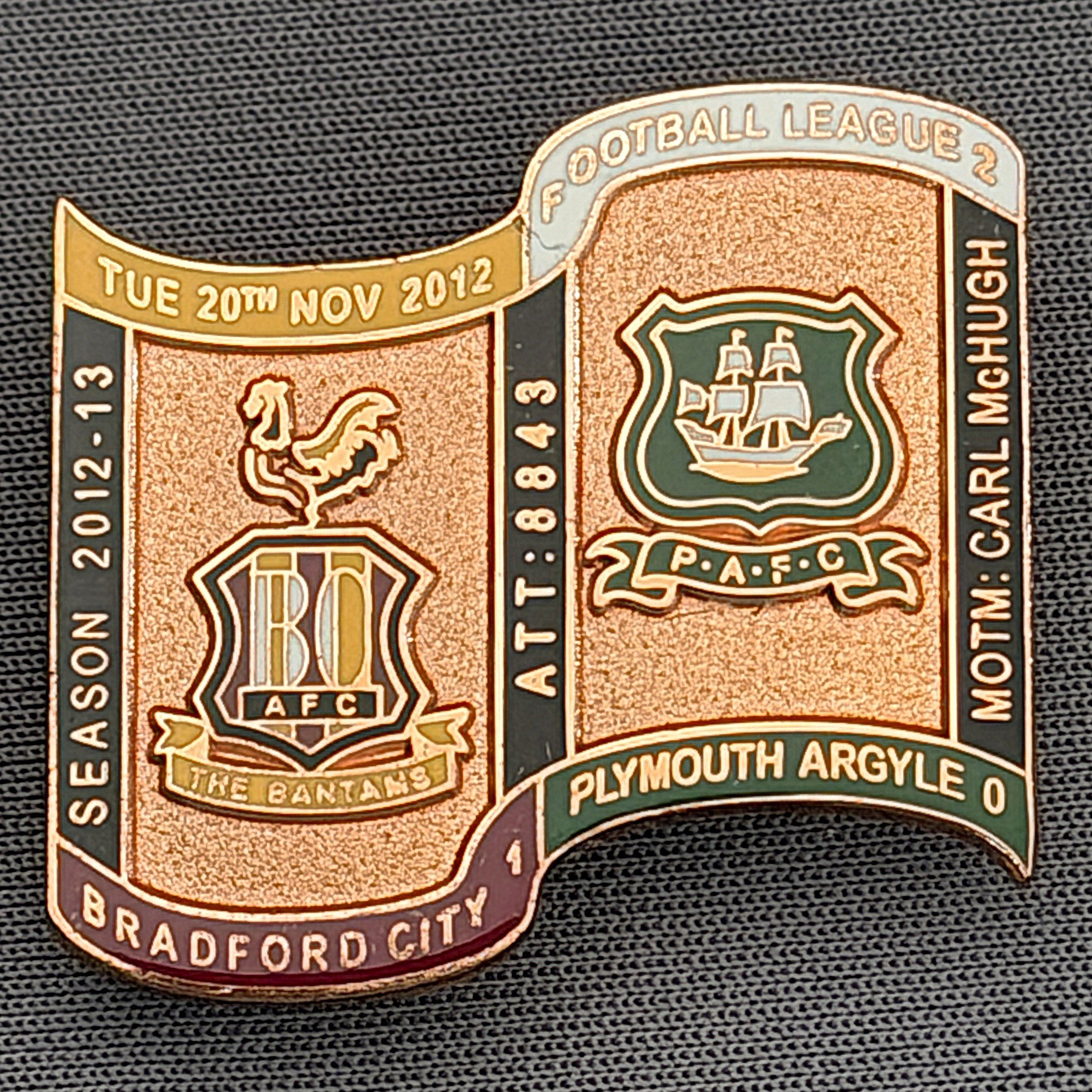 Reference Number: BCFIX171
Size: H 26.9 mm x W 29.2 mm
Pin Type: Brooch Pin
Plating: Copper
Value: £12
Manufacturer: Bradford City Badges
Comments: Bradford City v Plymouth Argyle 2012/13 Limited Edition 1 Badge (Copper Version)