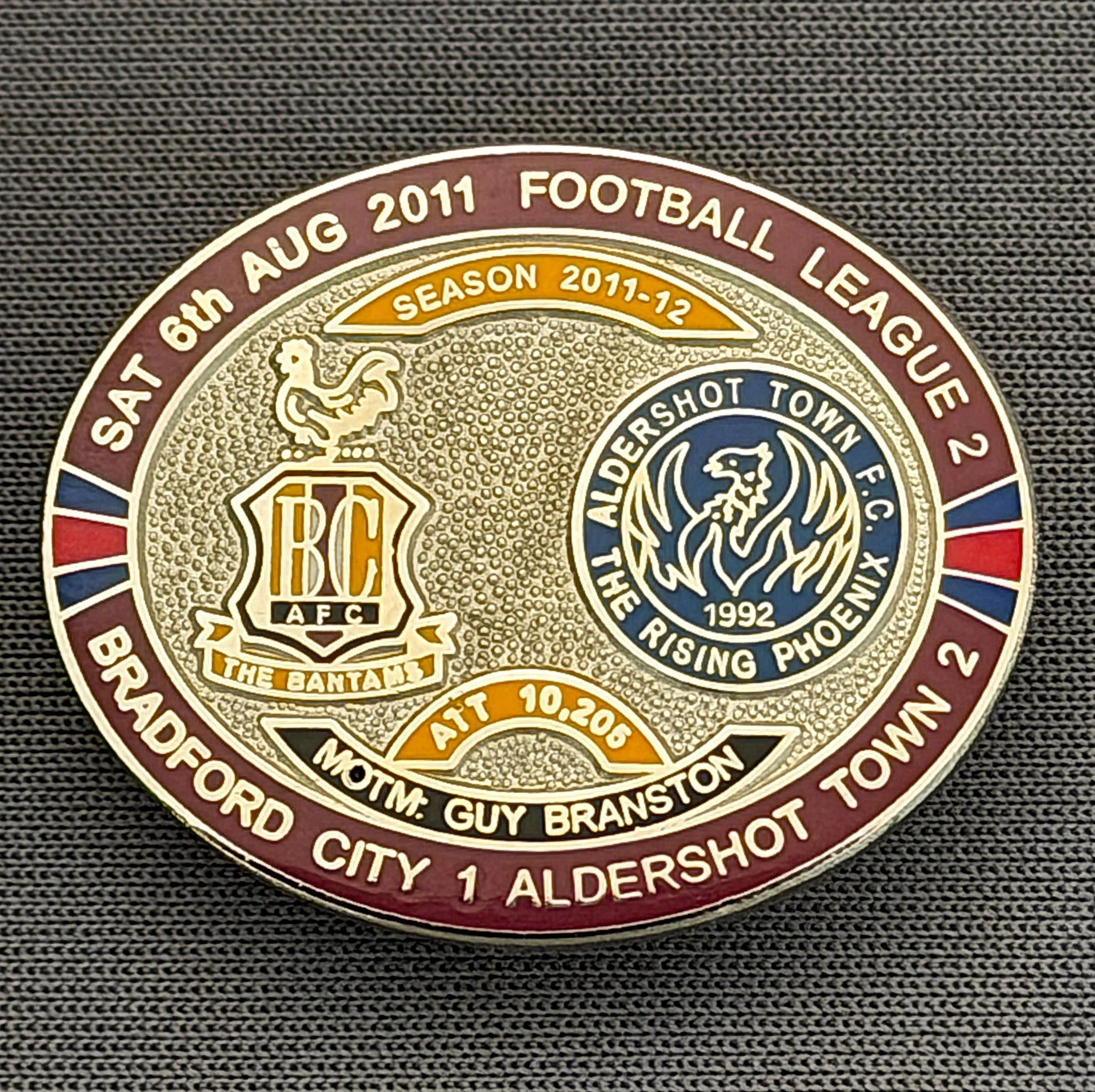 Reference Number: BCFIX093
Size: H 23.6 mm x W 28.7 mm
Pin Type: Brooch Pin
Plating: Silver
Value: £10
Manufacturer: Bradford City Badges
Comments: Bradford City v Aldershot Town  2011/12 Limited Edition 20 Badges (Silver Version)