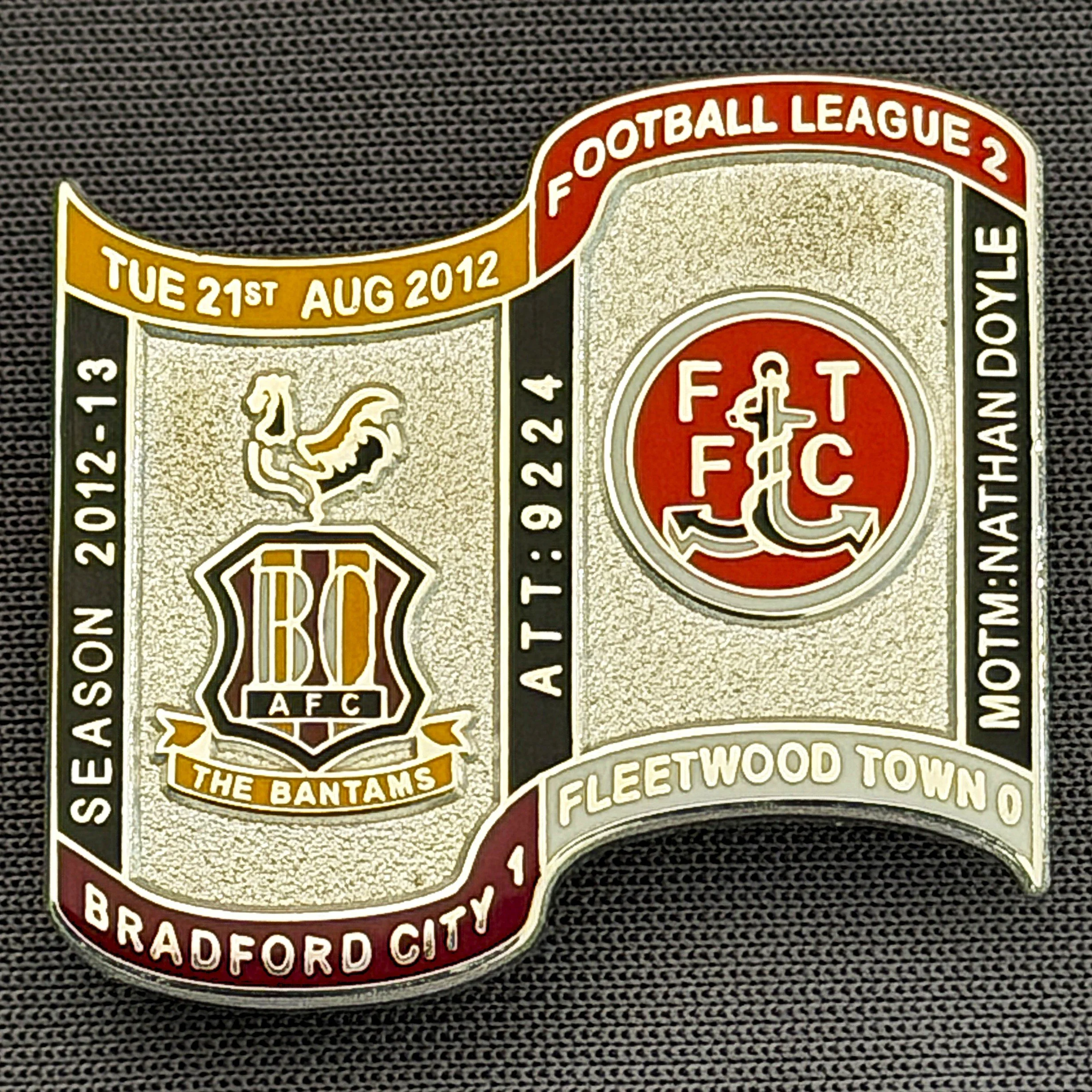 Reference Number: BCFIX184
Size: H 26.9 mm x W 29.2 mm
Pin Type: Brooch Pin
Plating: Silver
Value: £12
Manufacturer: Bradford City Badges
Comments: Bradford City v Fleetwood Town  2012/13 Limited Edition 1 Badge (Silver Version)