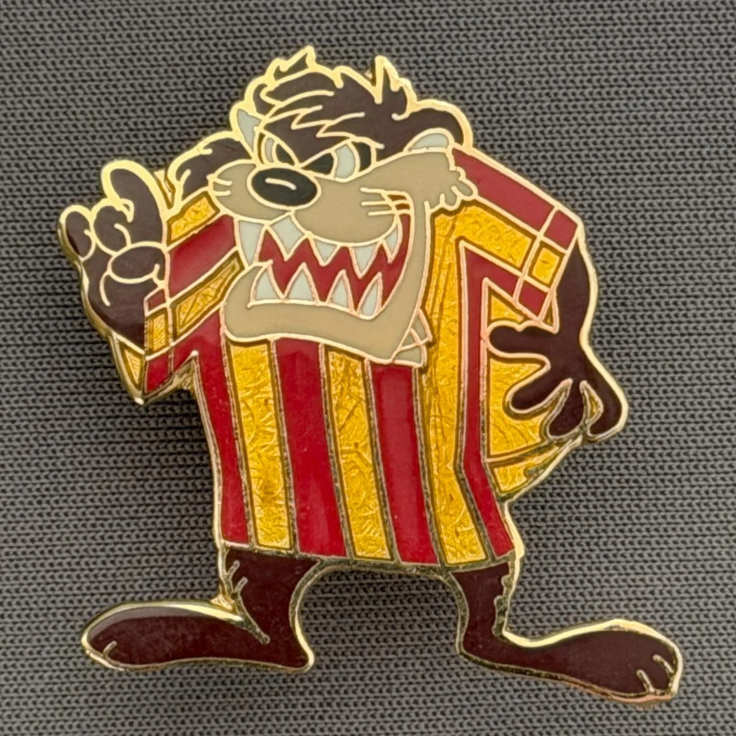 Reference Number: BCCTN026
Size: H 30 mm x W 27.8 mm
Pin Type: Brooch Pin
Plating: Gold
Value: £6
Manufacturer: Not Known
Comments: Tasmanian Devil in Bradford City Kit, Different Enamels