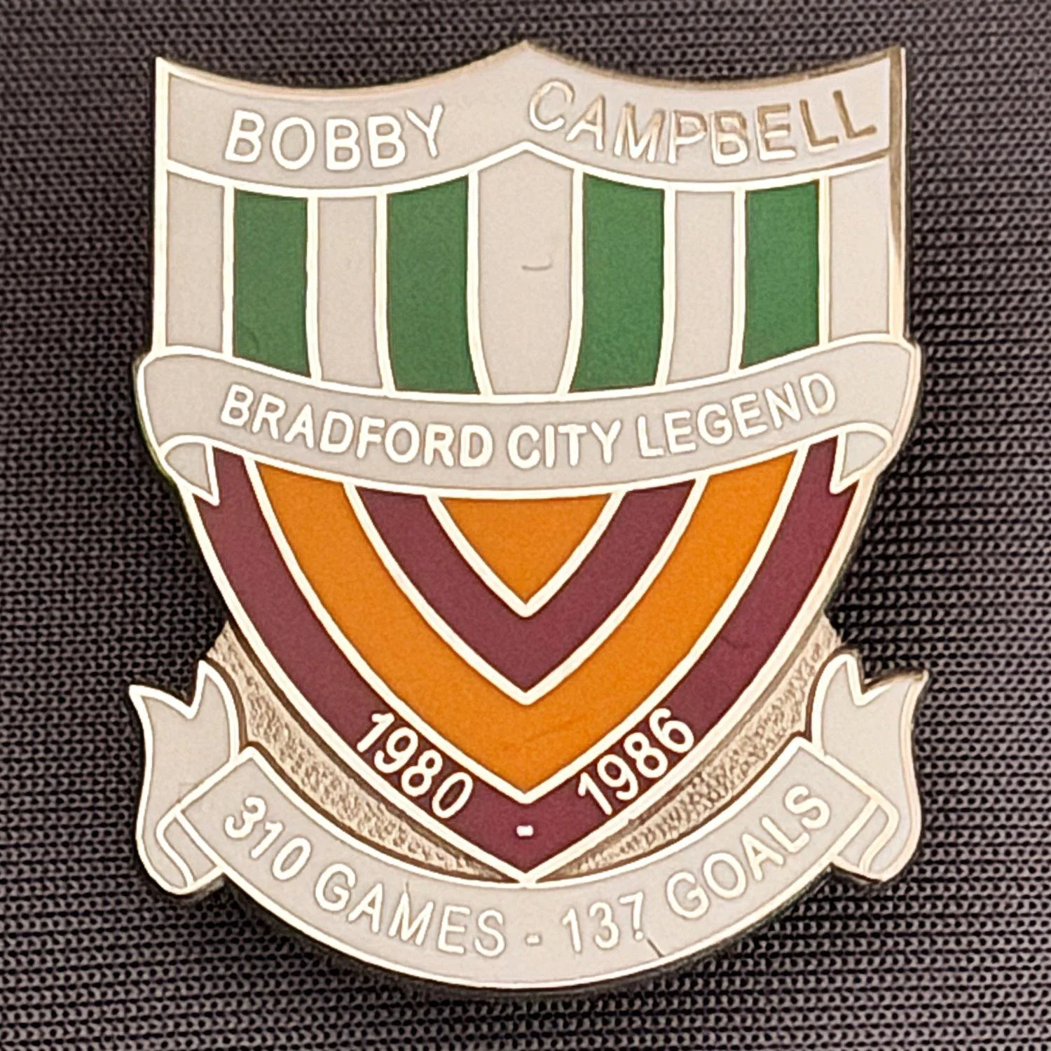 Reference Number: BCUN018
Size: H 32 mm x W 25.9 mm
Pin Type: Metal Clutch
Plating: Silver
Value: £10
Manufacturer: Bradford City Badges
Comments: Bobby Campbell Limited Edition of 25. Boxed Set of 4. Issued 2012. Green & White, Claret & Amber Versio