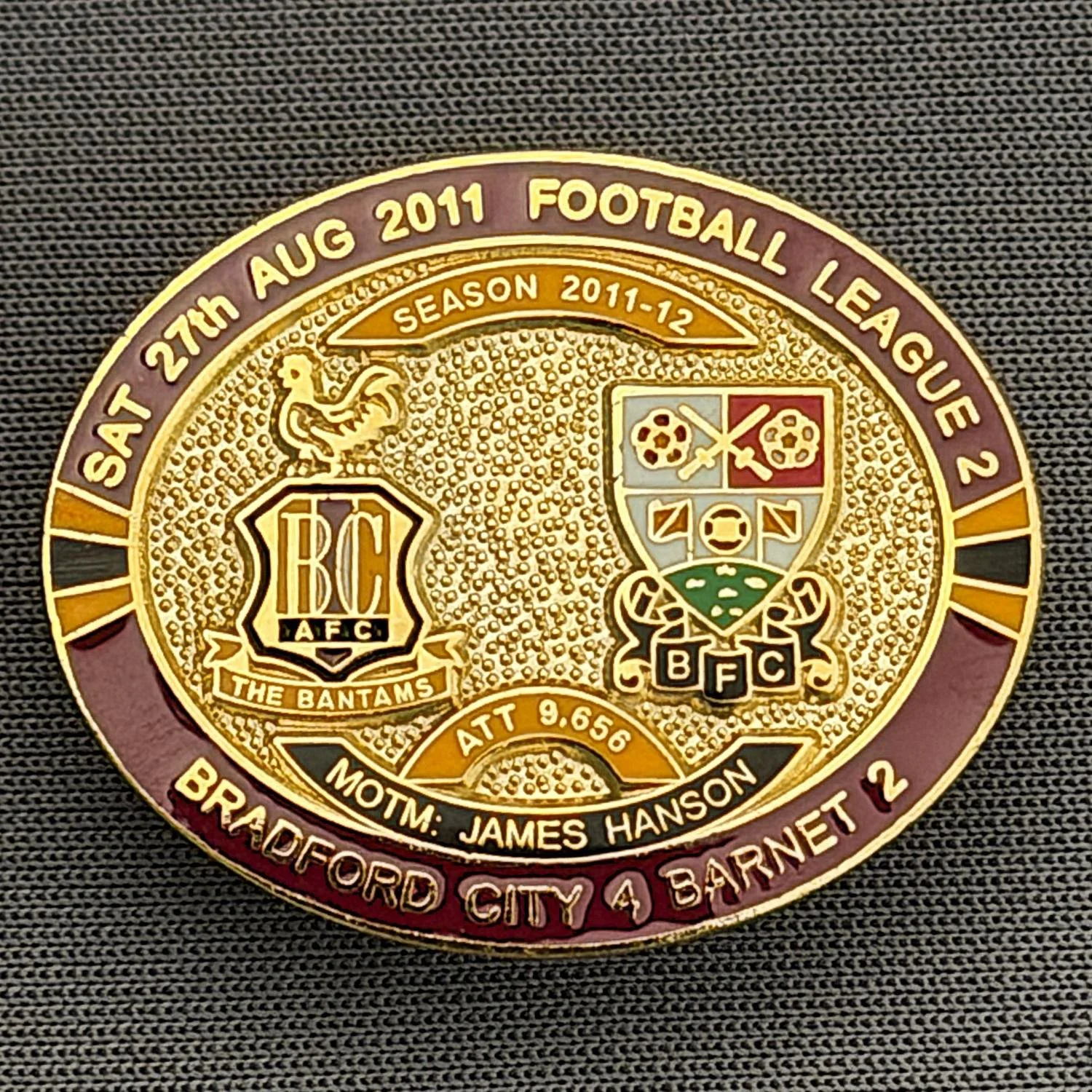 Reference Number: BCFIX072
Size: H 23.6 mm x W 28.7 mm
Pin Type: Brooch Pin
Plating: Gold
Value: £8
Manufacturer: Bradford City Badges
Comments: Bradford City v Barnet 2011/12 Limited Edition 80 Badges