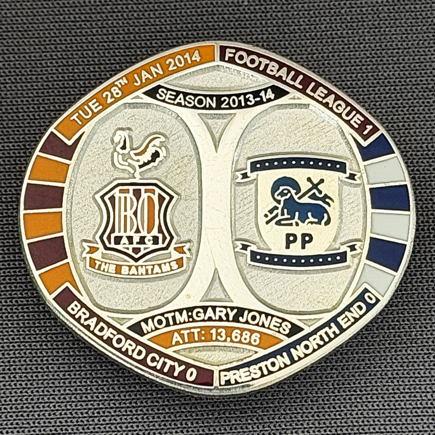 Reference Number: BCFIX221
Size: H 26.3 mm x W 28.9 mm
Pin Type: Brooch Pin
Plating: Silver
Value: £10
Manufacturer: Bradford City Badges
Comments: Bradford City v Preston North End  2013/14 Limited Edition 10 Badges (Silver Version)