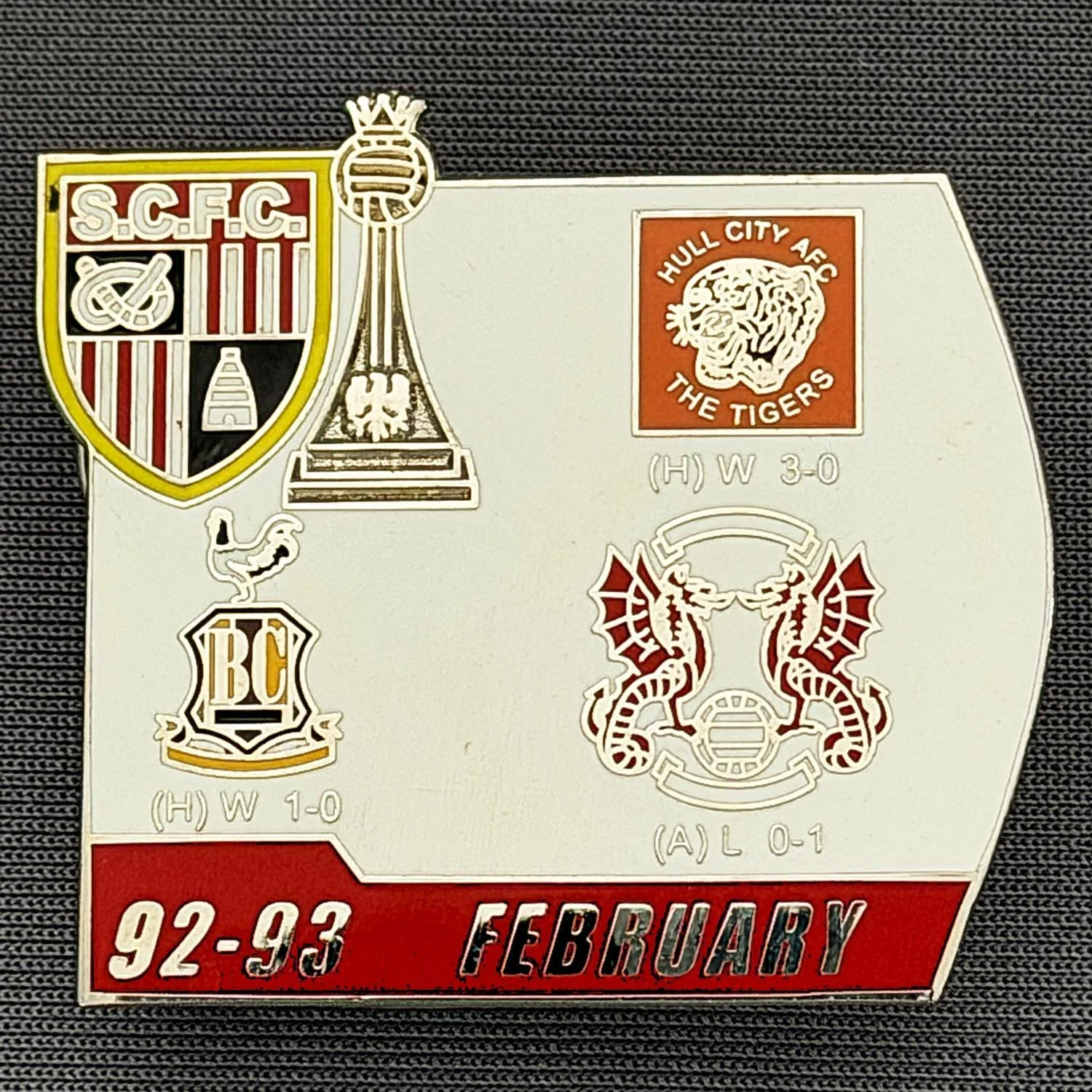 Reference Number: BCOFIX125
Size: H 34.6 mm x W 38.2 mm
Pin Type: Double Metal Clutch
Plating: Silver
Value: £5
Manufacturer: Unknown
Comments: Stoke City v Bradford City & Others 1993, White & Red Version 