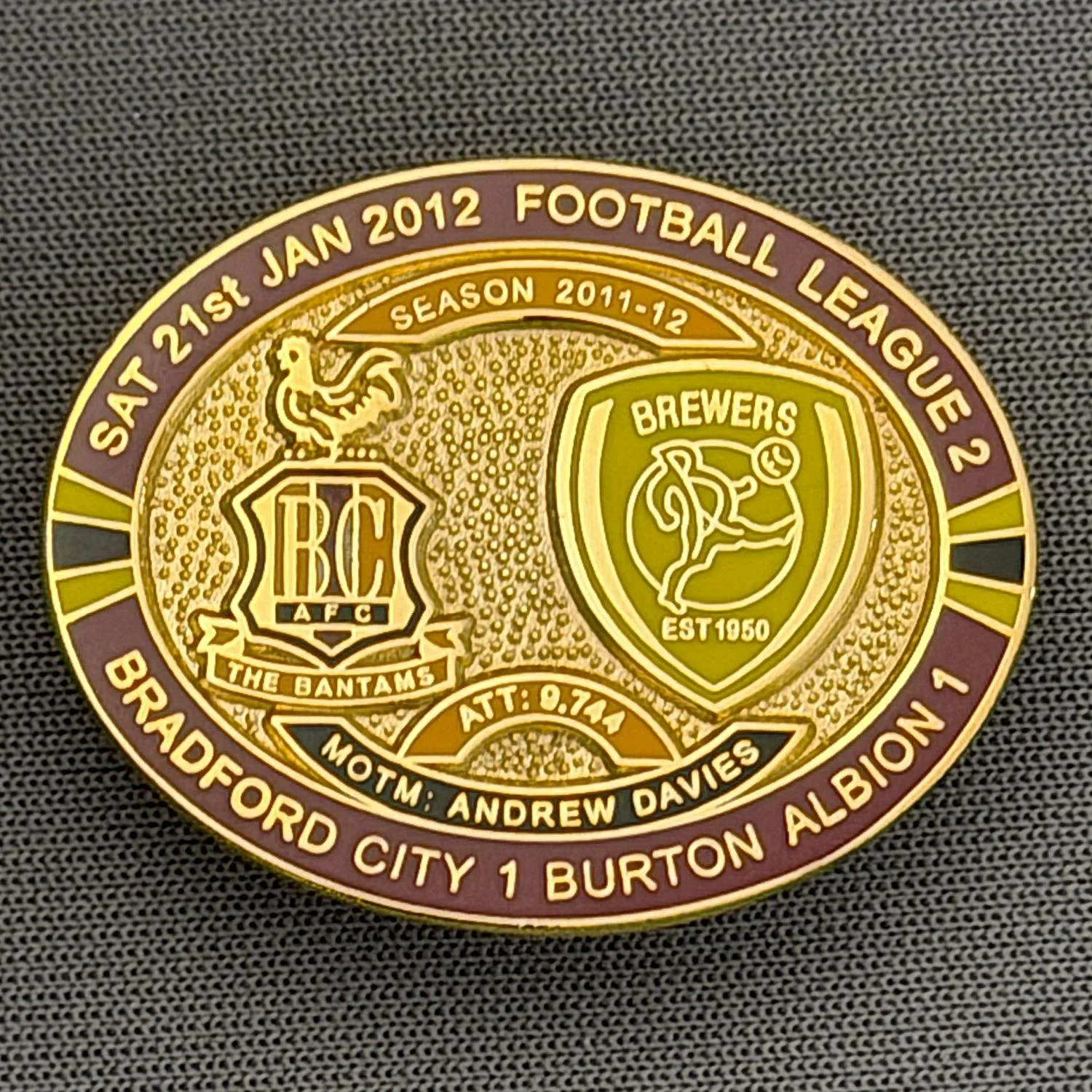 Reference Number: BCFIX083
Size: H 23.6 mm x W 28.7 mm
Pin Type: Brooch Pin
Plating: Gold
Value: £8
Manufacturer: Bradford City Badges
Comments: Bradford City v Burton Albion 2011/12 Limited Edition 80 Badges