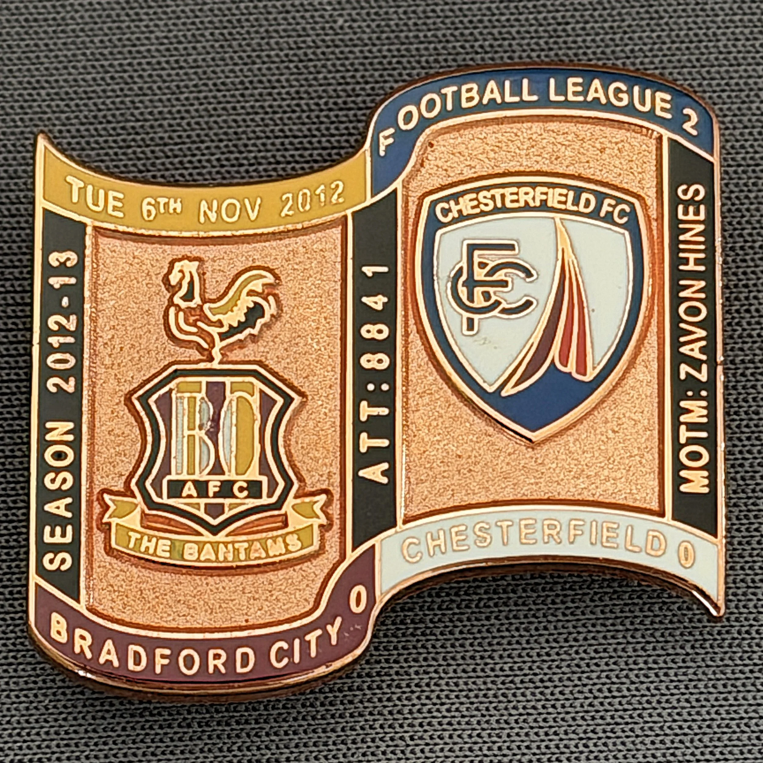 Reference Number: BCFIX169
Size: H 26.9 mm x W 29.2 mm
Pin Type: Brooch Pin
Plating: Copper
Value: £12
Manufacturer: Bradford City Badges
Comments: Bradford City v Chesterfield  2012/13 Limited Edition 1 Badge (Copper Version)