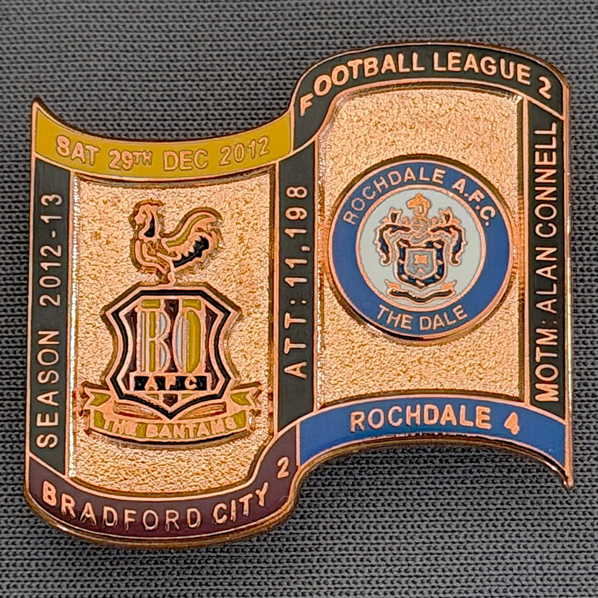 Reference Number: BCFIX174
Size: H 26.9 mm x W 29.2 mm
Pin Type: Brooch Pin
Plating: Copper
Value: £12
Manufacturer: Bradford City Badges
Comments: Bradford City v Rochdale  2012/13 Limited Edition 1 Badge (Copper Version)