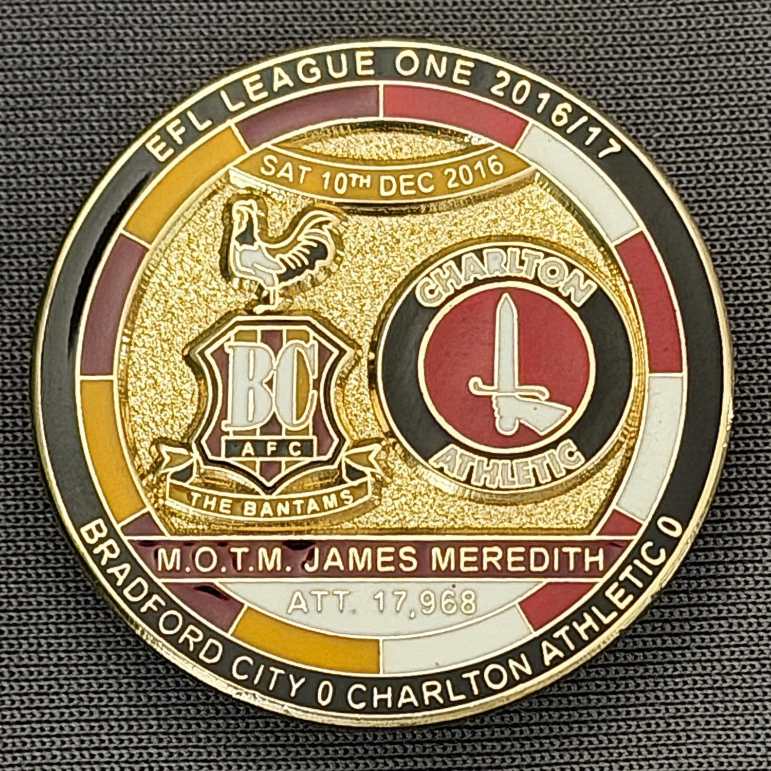 Reference Number: BCFIX379
Size: D 29.4 mm
Pin Type: Brooch Pin
Plating: Gold
Value: £8
Manufacturer: Bradford City Badges
Comments: Bradford City v Charlton Athletic 2015/16, Limited Edition of 50 Badges (Gold Version)
