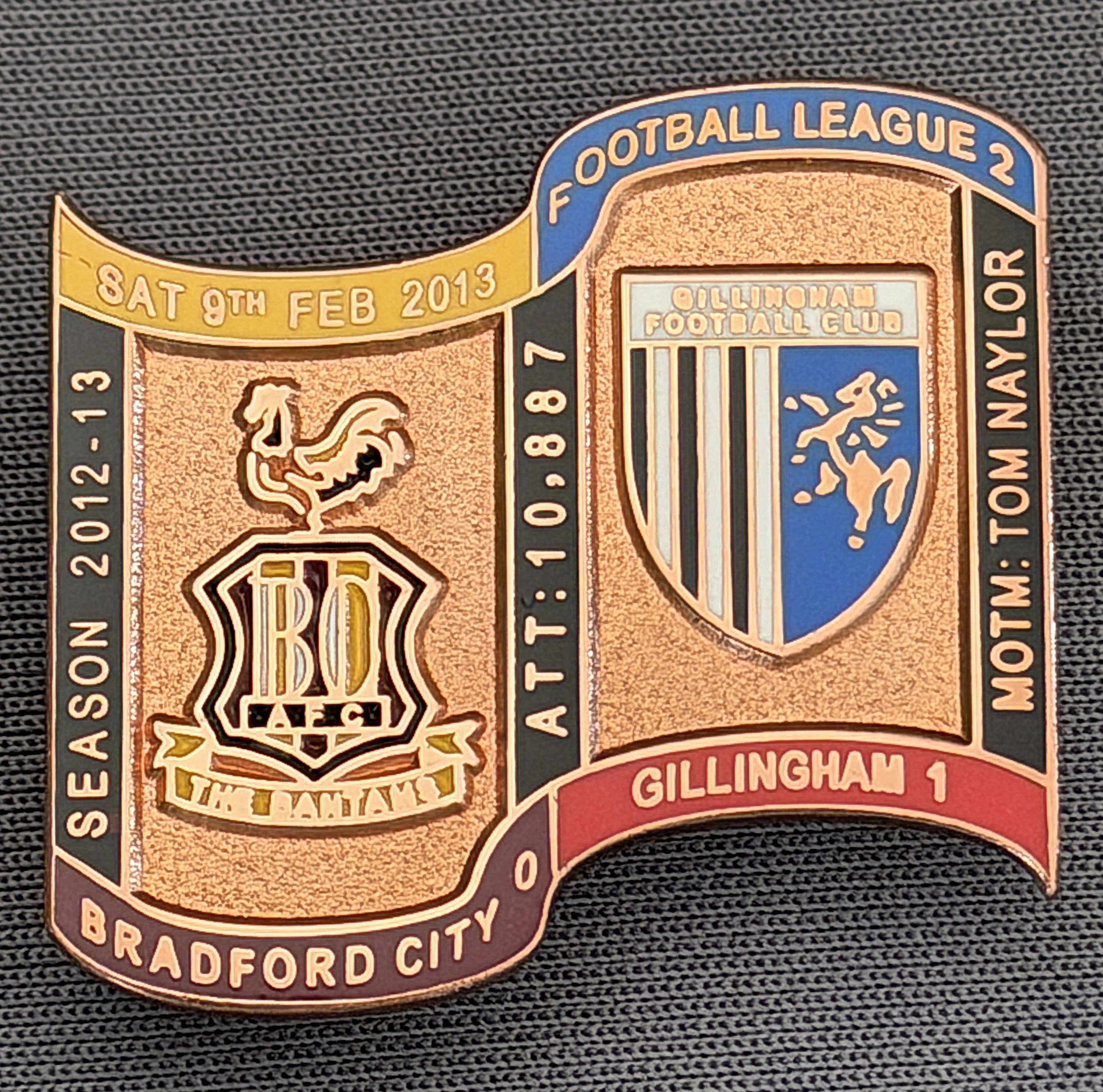 Reference Number: BCFIX176
Size: H 26.9 mm x W 29.2 mm
Pin Type: Brooch Pin
Plating: Copper
Value: £12
Manufacturer: Bradford City Badges
Comments: Bradford City v Gillingham  2012/13 Limited Edition 1 Badge (Copper Version)