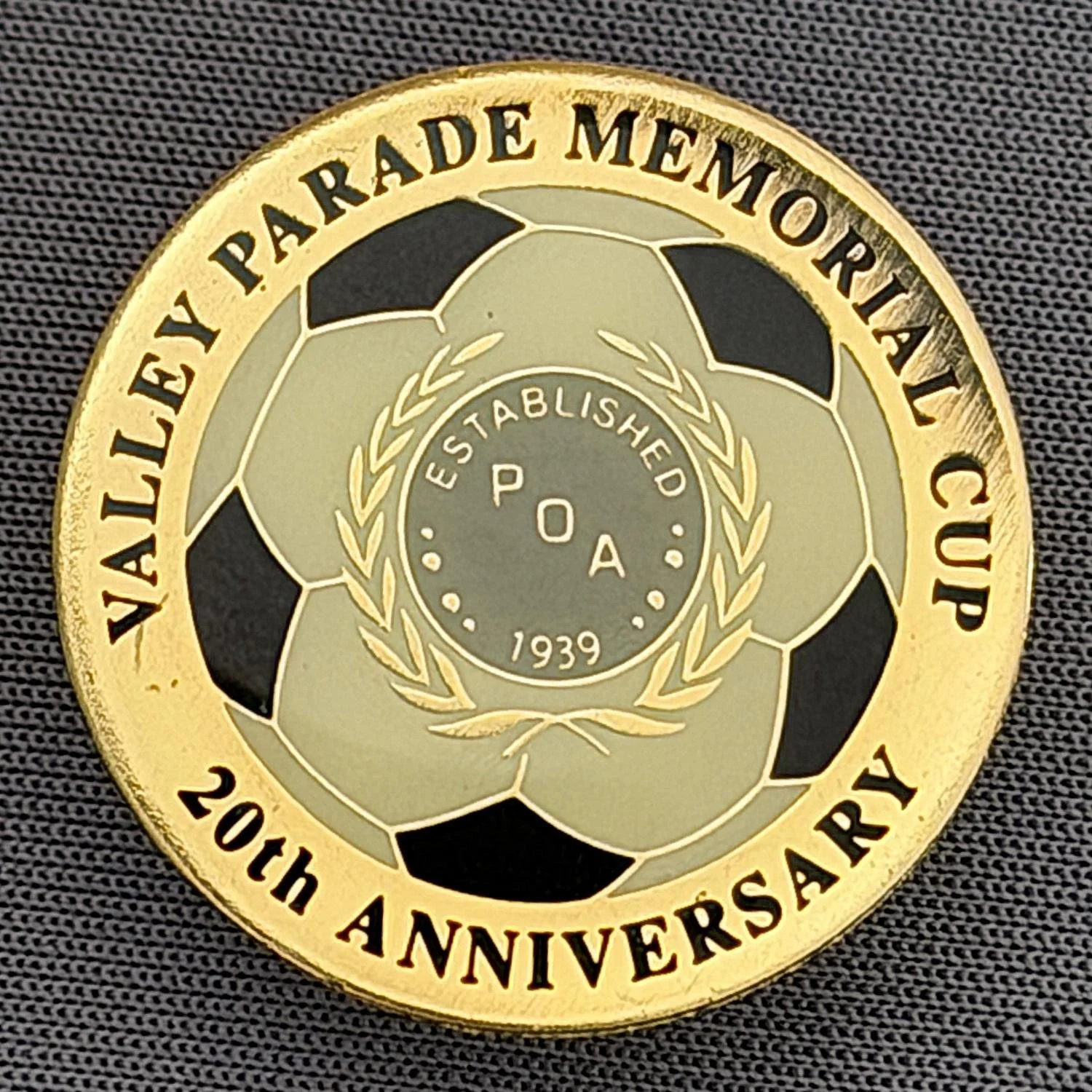 Reference Number: BCEVE025
Size: D 25 mm
Pin Type: Metal Clutch
Plating: Gold
Value: £12
Manufacturer: Rocket Badge
Comments: Valley Parade Memorial Cup 20th Anniversary